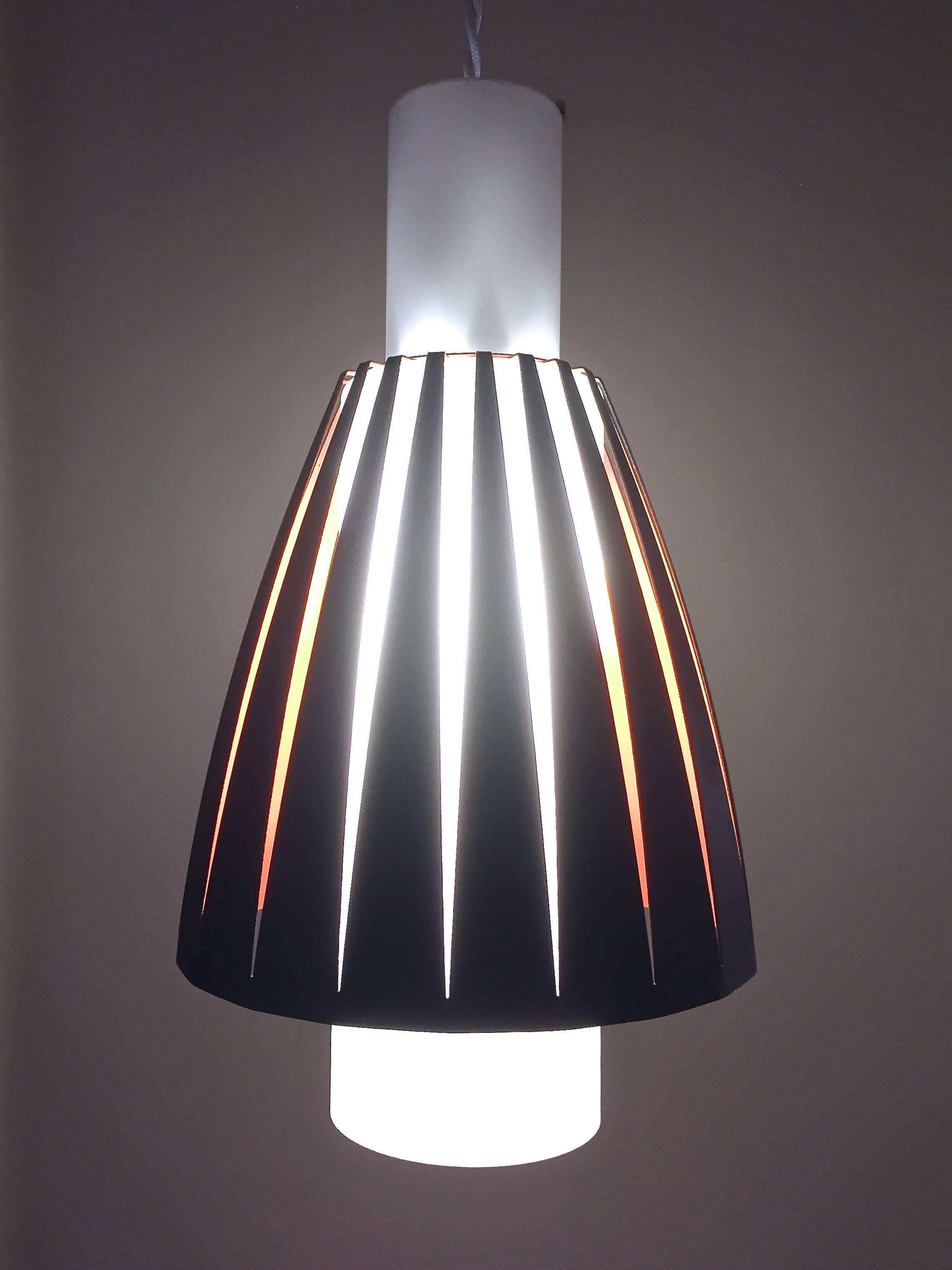 Jo Hammerborg pendant lamp in glass and metal. Opal glass with skirt in lacquered metal in red and black.