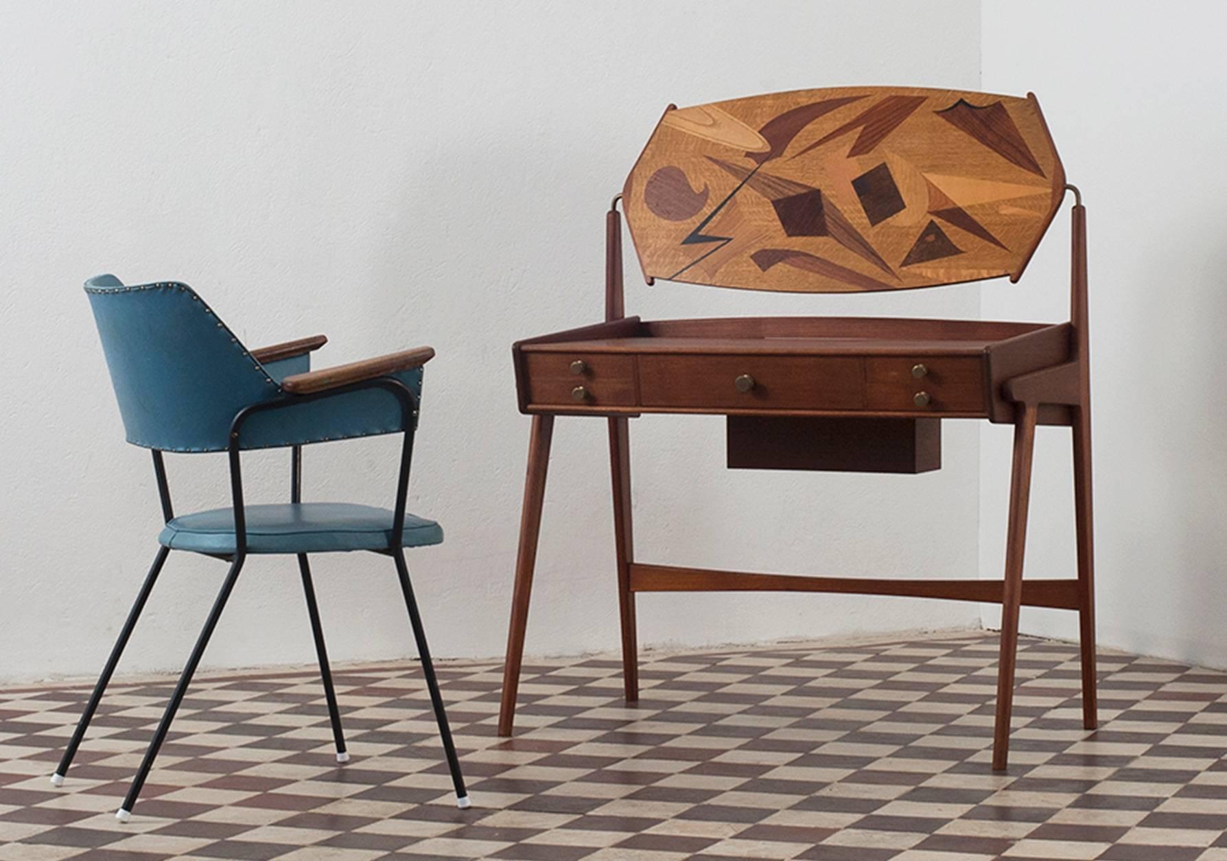 Marquetry table with an adjustable mirror and five drawers plus a secret folding compartment. Scandinavian design from 1959. The marquetry work combines rosewood, teak, birch, cherry and ash.

This item was uniquely designed and commissioned by a