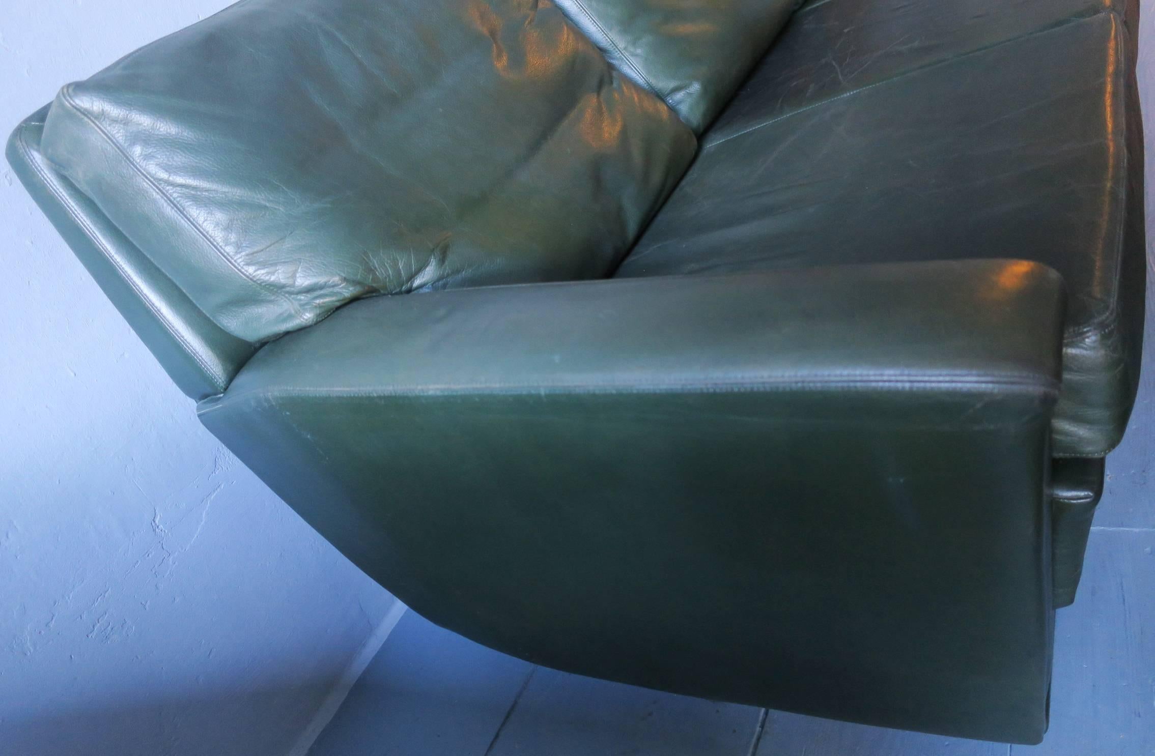 Green leather Mid-Century sofa on teak feet, from Denmark, 1960s.