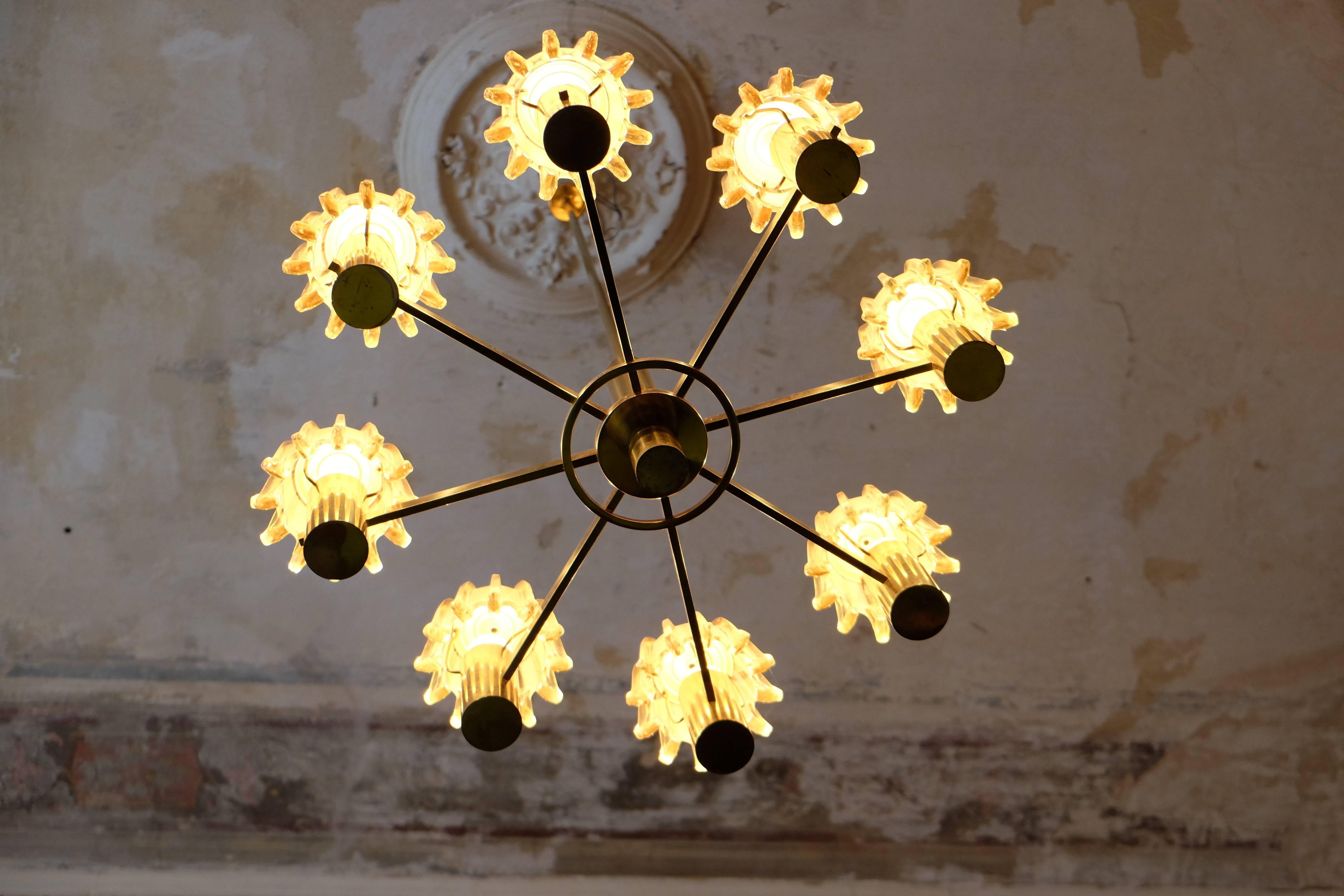 Unusual and striking brass and glass chandelier, Mid-Century.