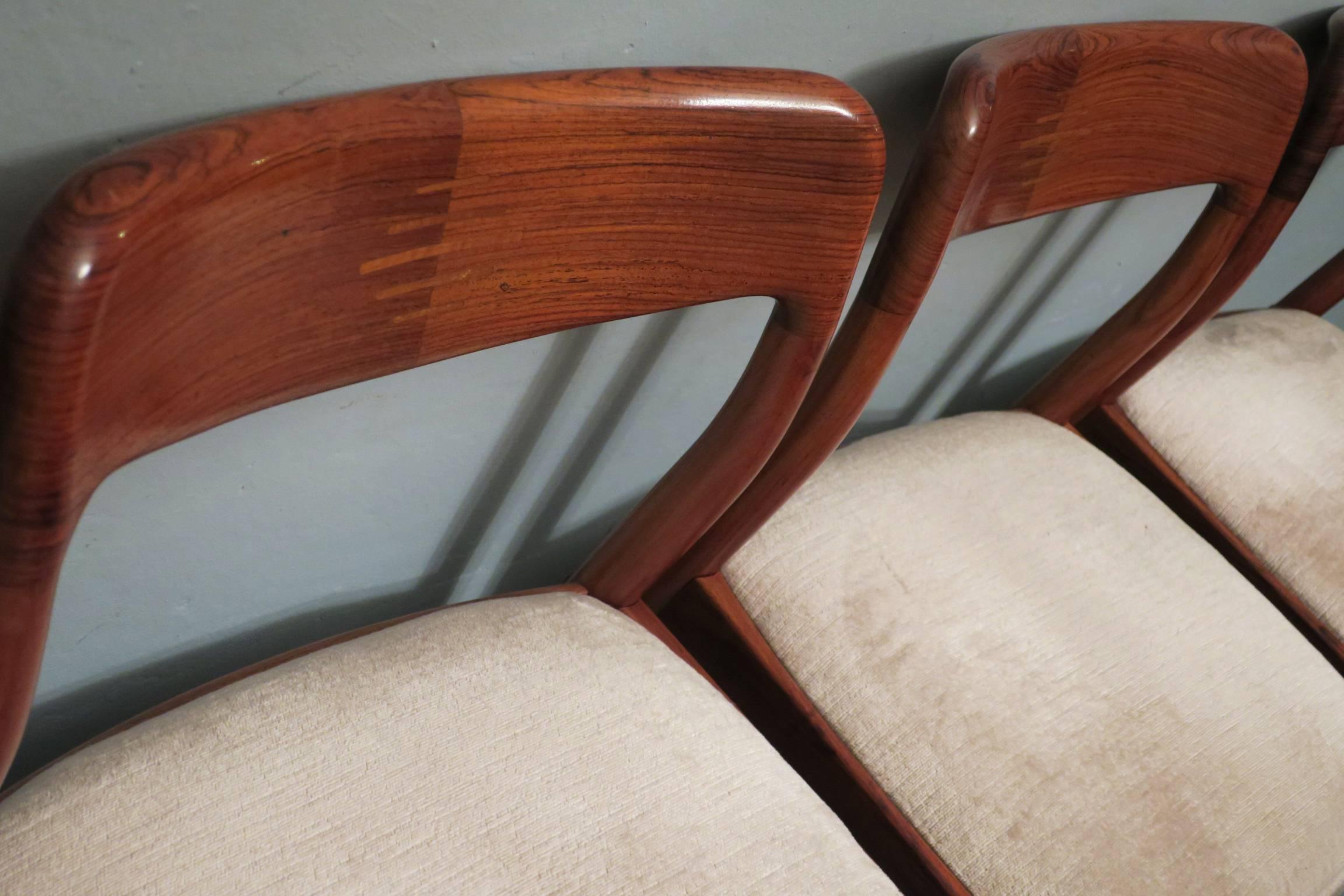 A set of four Danish rosewood dining chairs with inlay front and back and mohair seats.