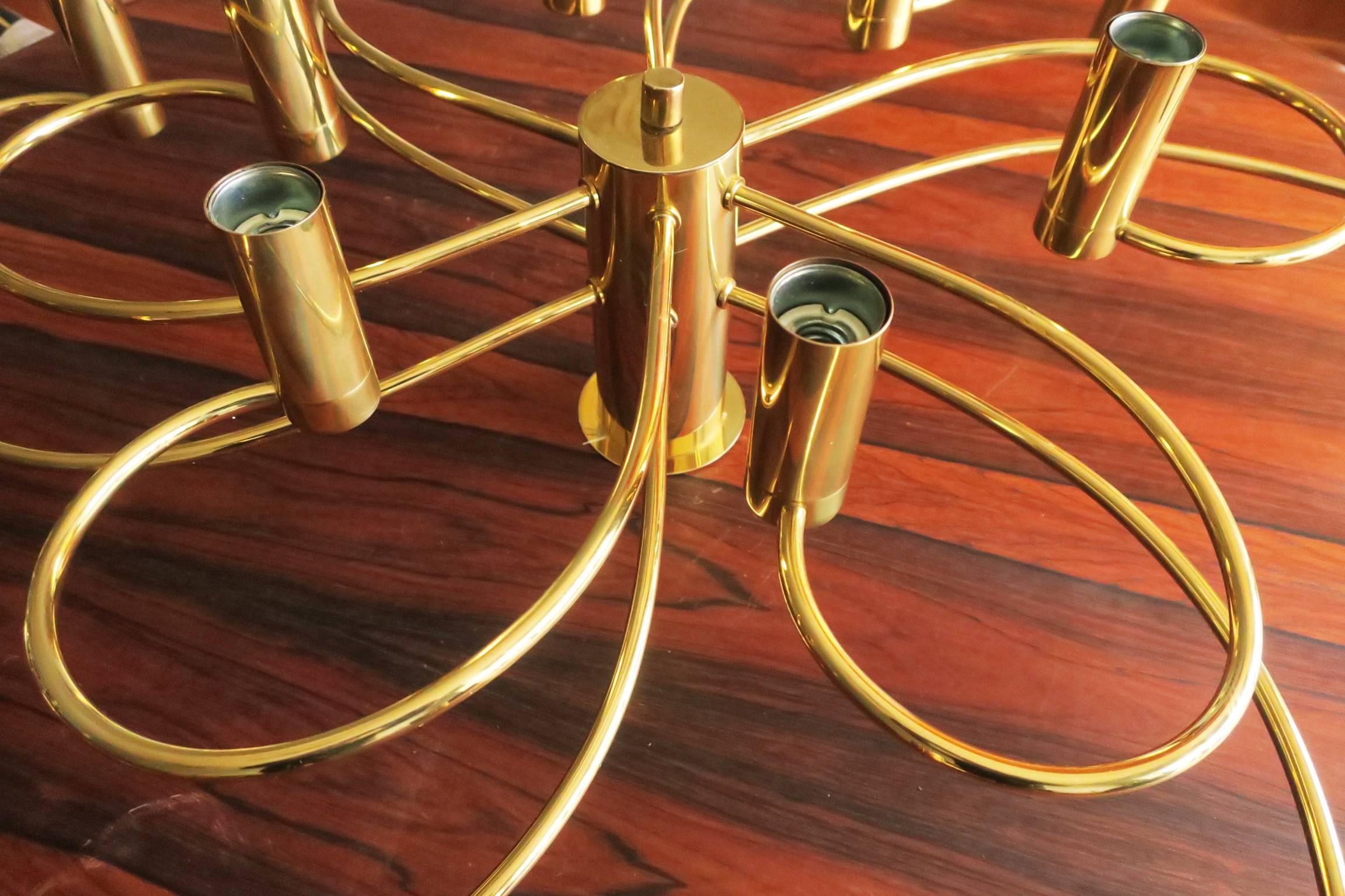Honsel flush mount brass chandelier with two spiraling tiers,

Bulbs: If sold to the US or Canada the chandelier will be delivered with simple screw-in adapters to fit standard US candelabra bulbs.