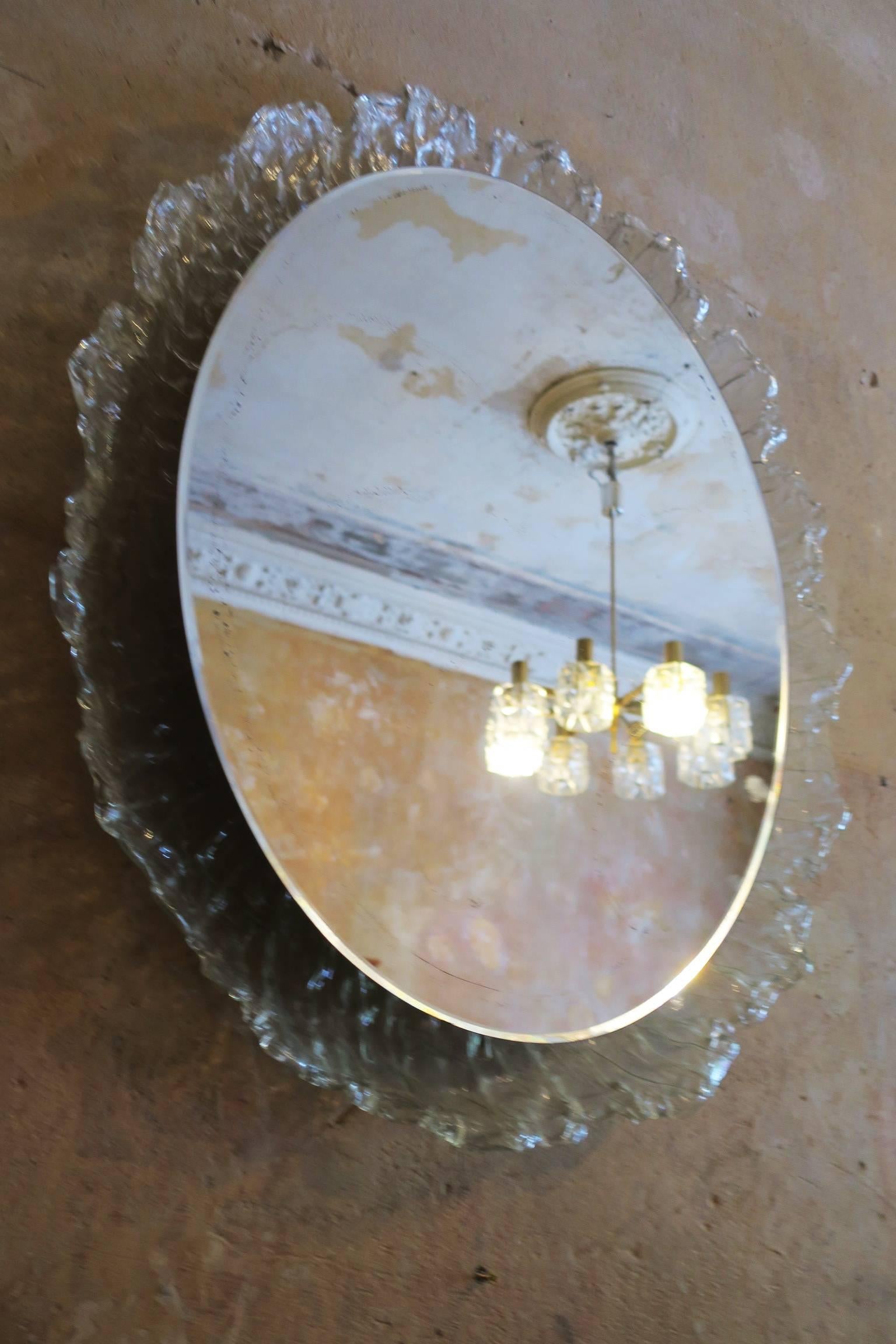 Large melted ice effect Lucite illuminated oval mirror.