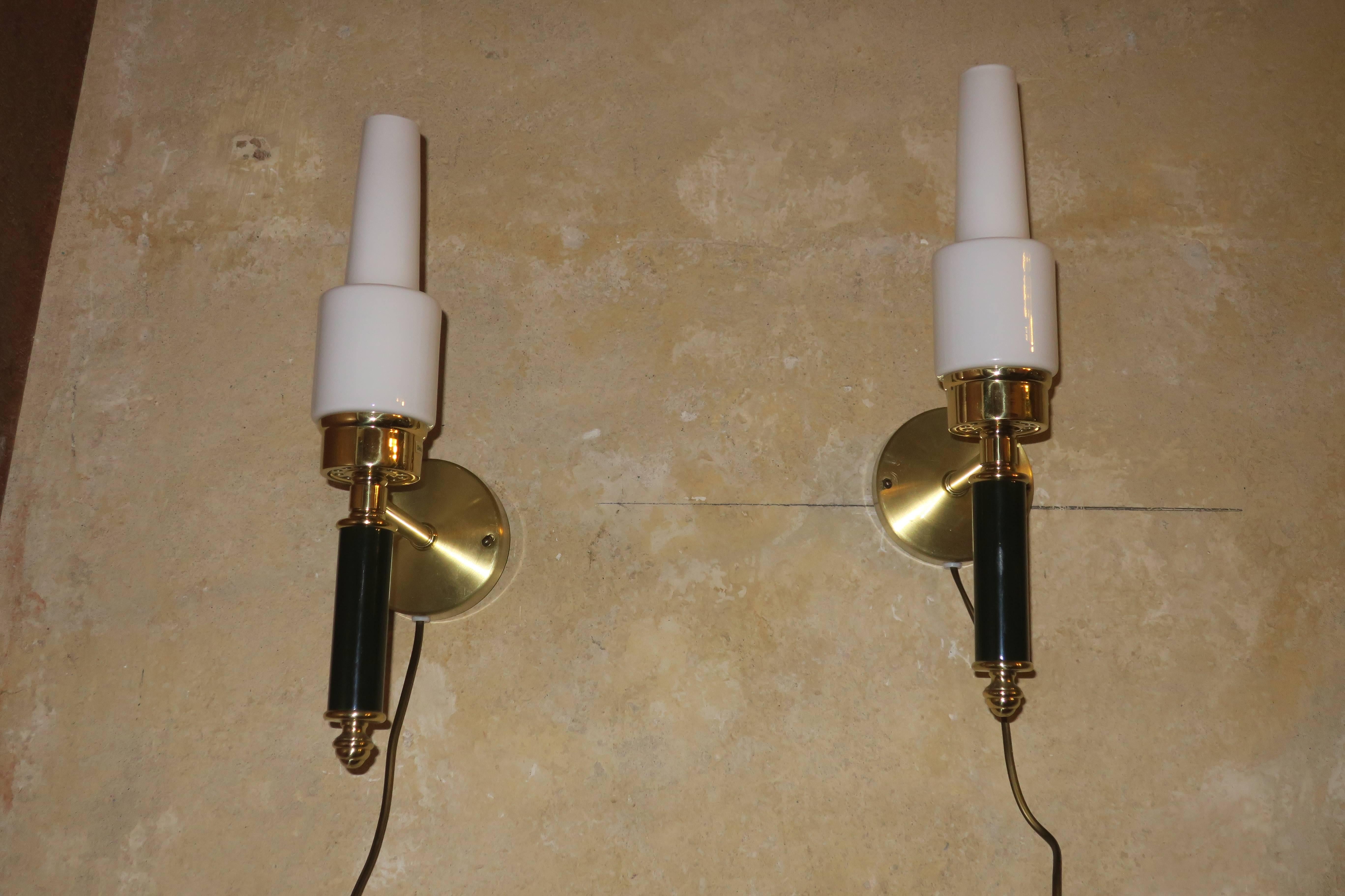 Pair of Swedish C E Fors for EWA Värnamo brass and glass sconces in very good condition.
If sold to the US or Canada will be supplied with simple screw-in adapters for standard candelabra bulbs.