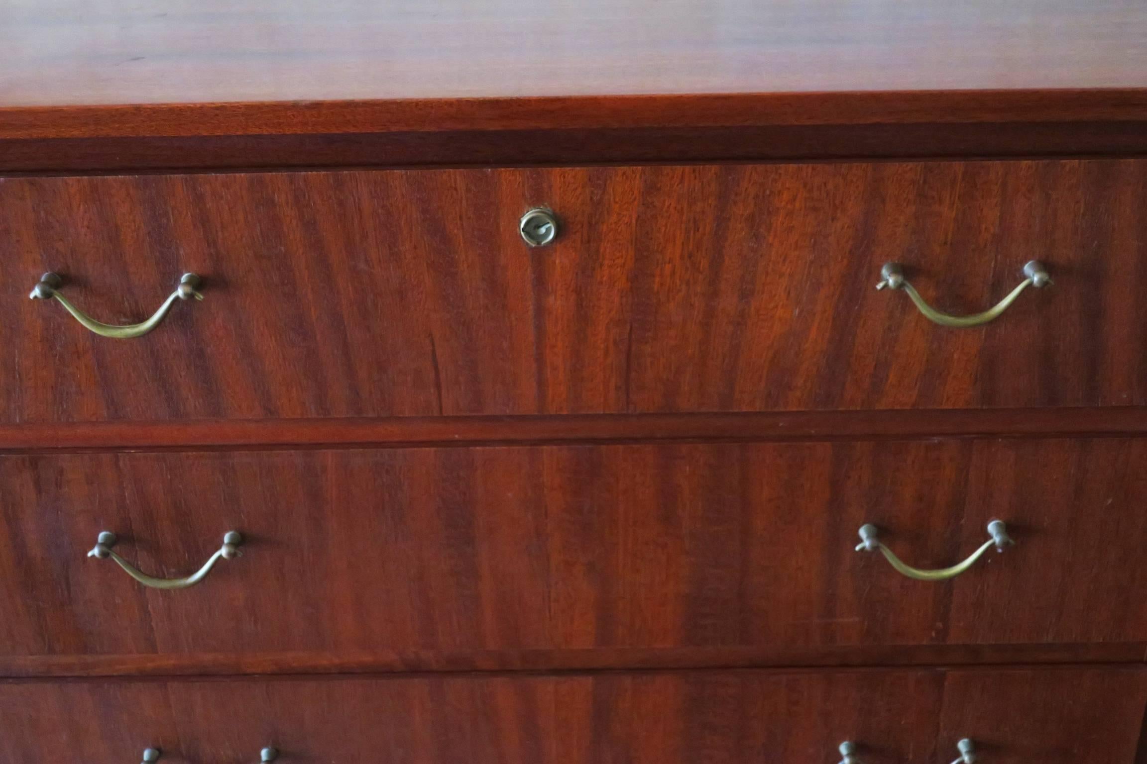 Small Scandinavian chest of drawers in warm-colored teak, 1960s.