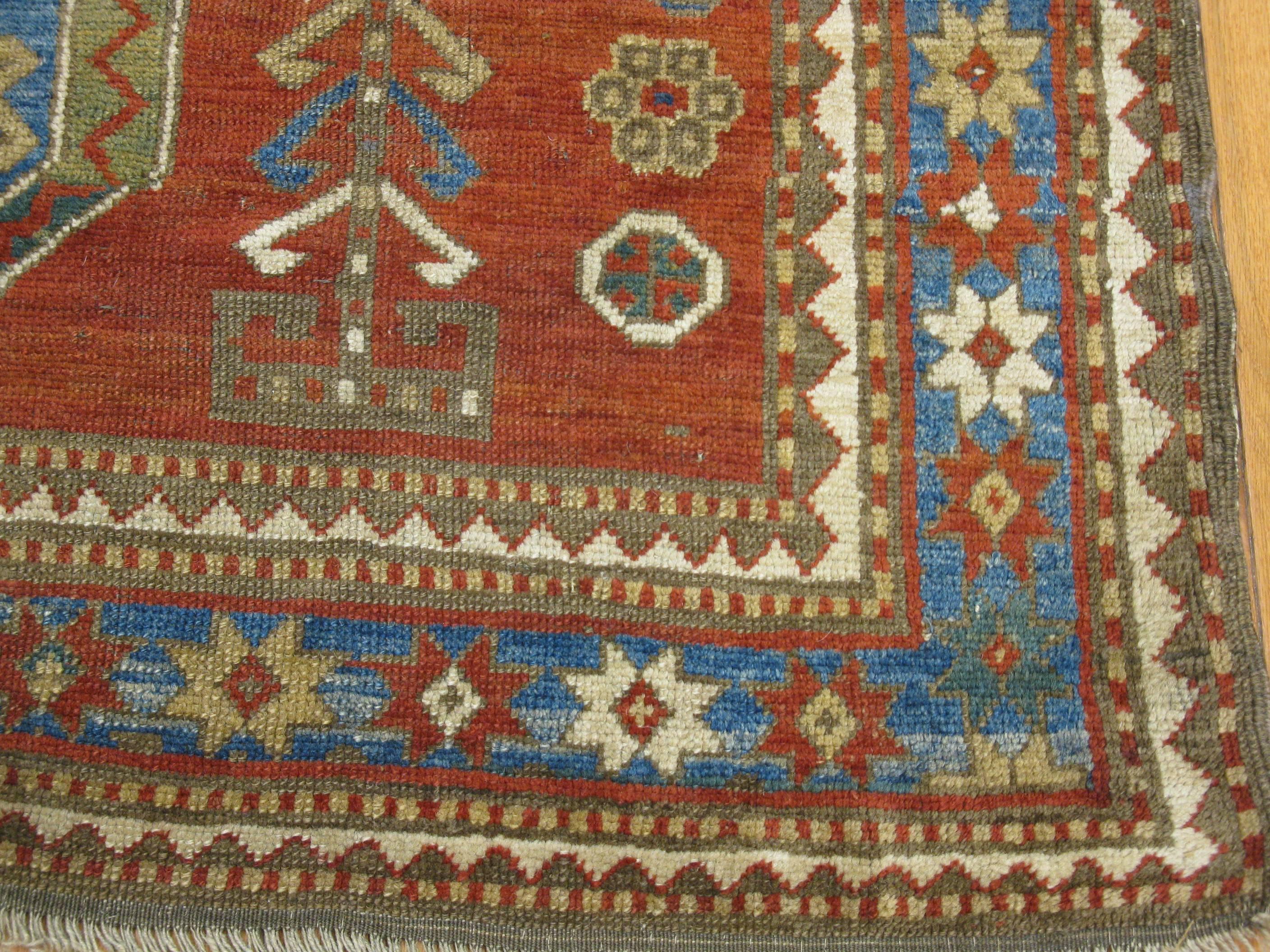 Antique Hand Knotted Wool Caucasian Kazak Area Rug In Good Condition For Sale In Atlanta, GA