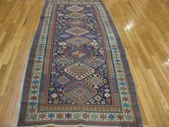 Antique Hand Knotted Wool Caucasian Shirvan Runner Rug