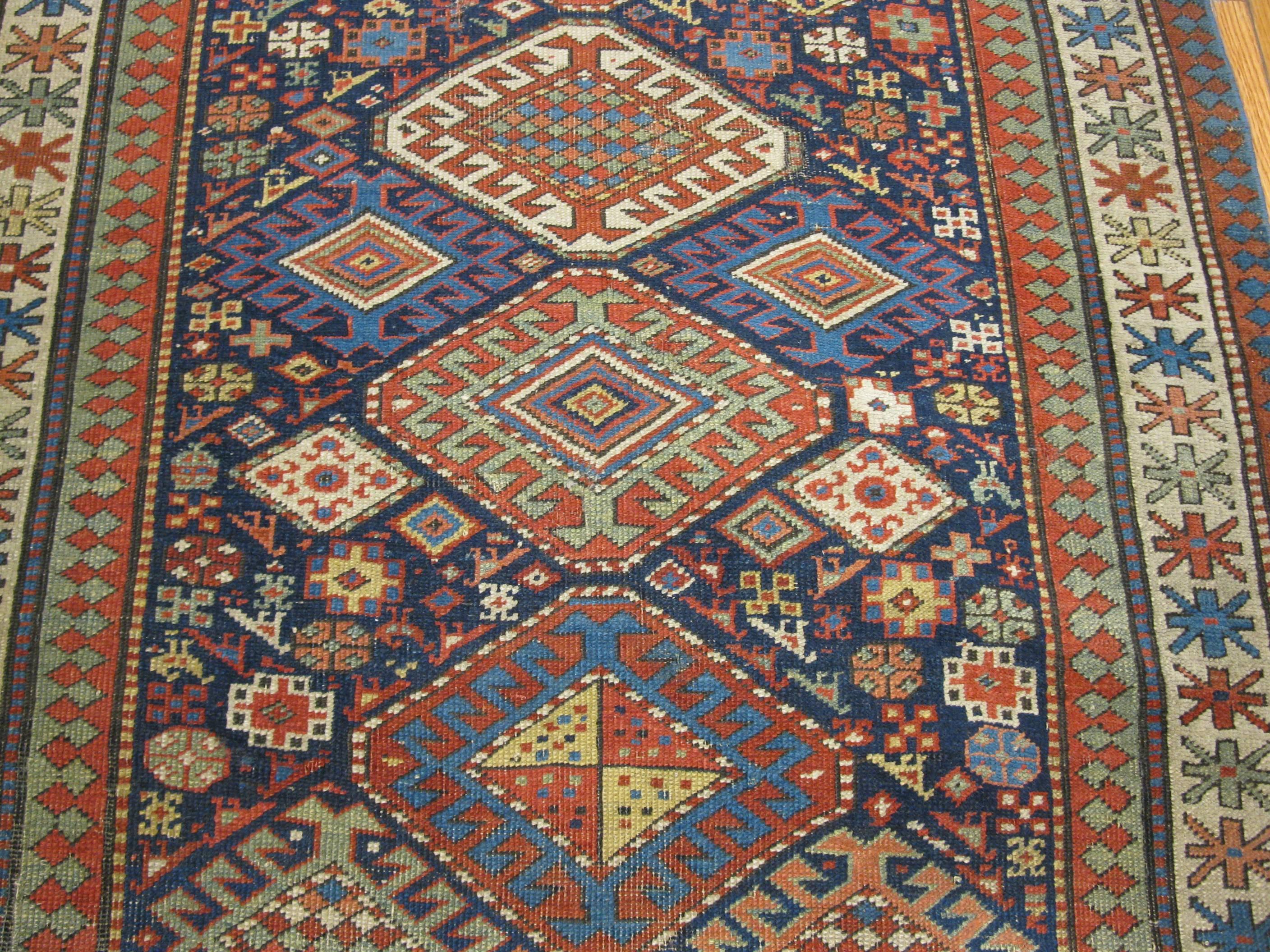 Tribal Antique Hand Knotted Wool Caucasian Shirvan Runner Rug For Sale