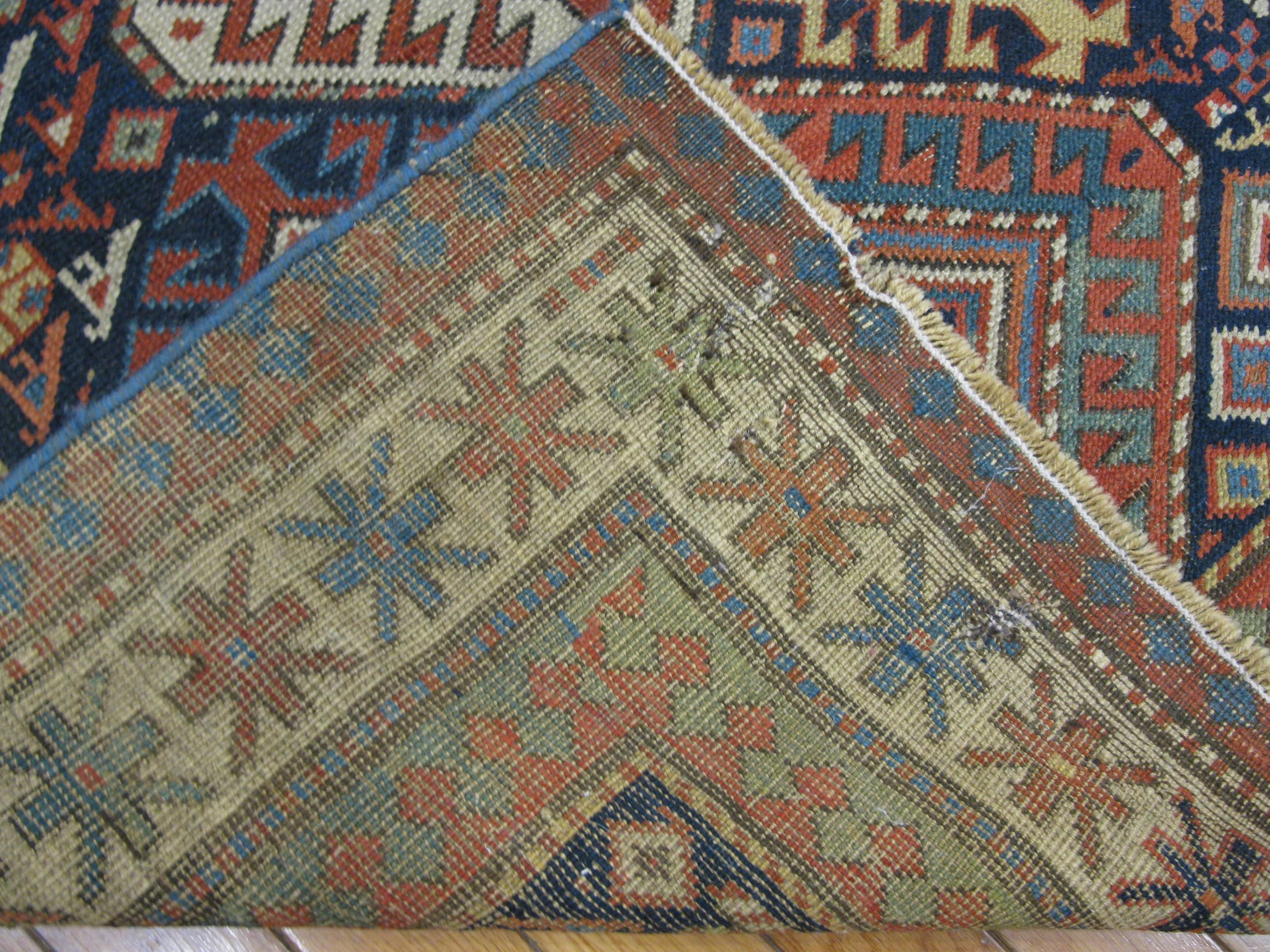 Antique Hand Knotted Wool Caucasian Shirvan Runner Rug In Good Condition For Sale In Atlanta, GA
