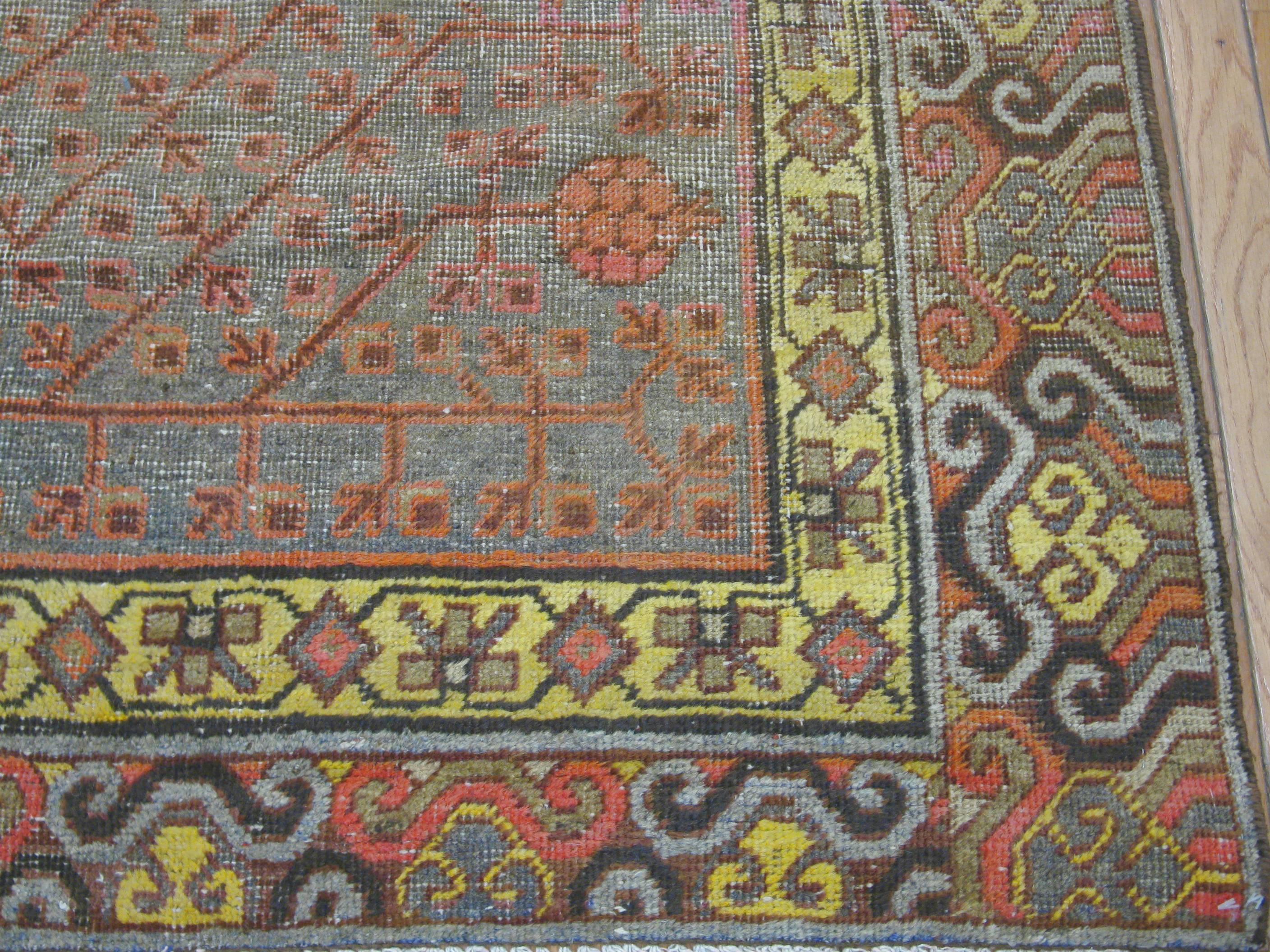 19th Century Antique Hand Knotted Wool Gallery Size Khotan Rug For Sale