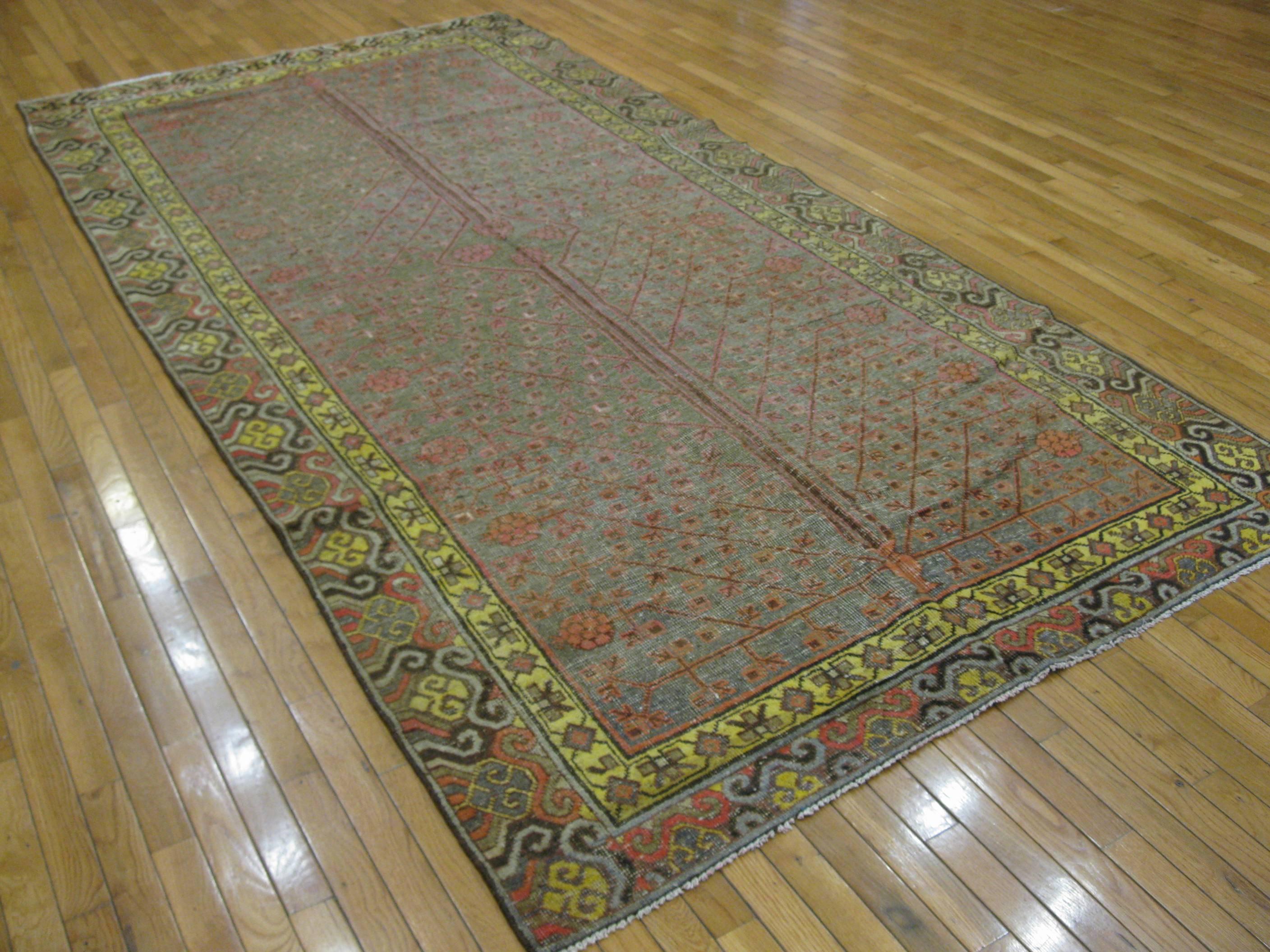 Hand-Knotted Antique Hand Knotted Wool Gallery Size Khotan Rug For Sale