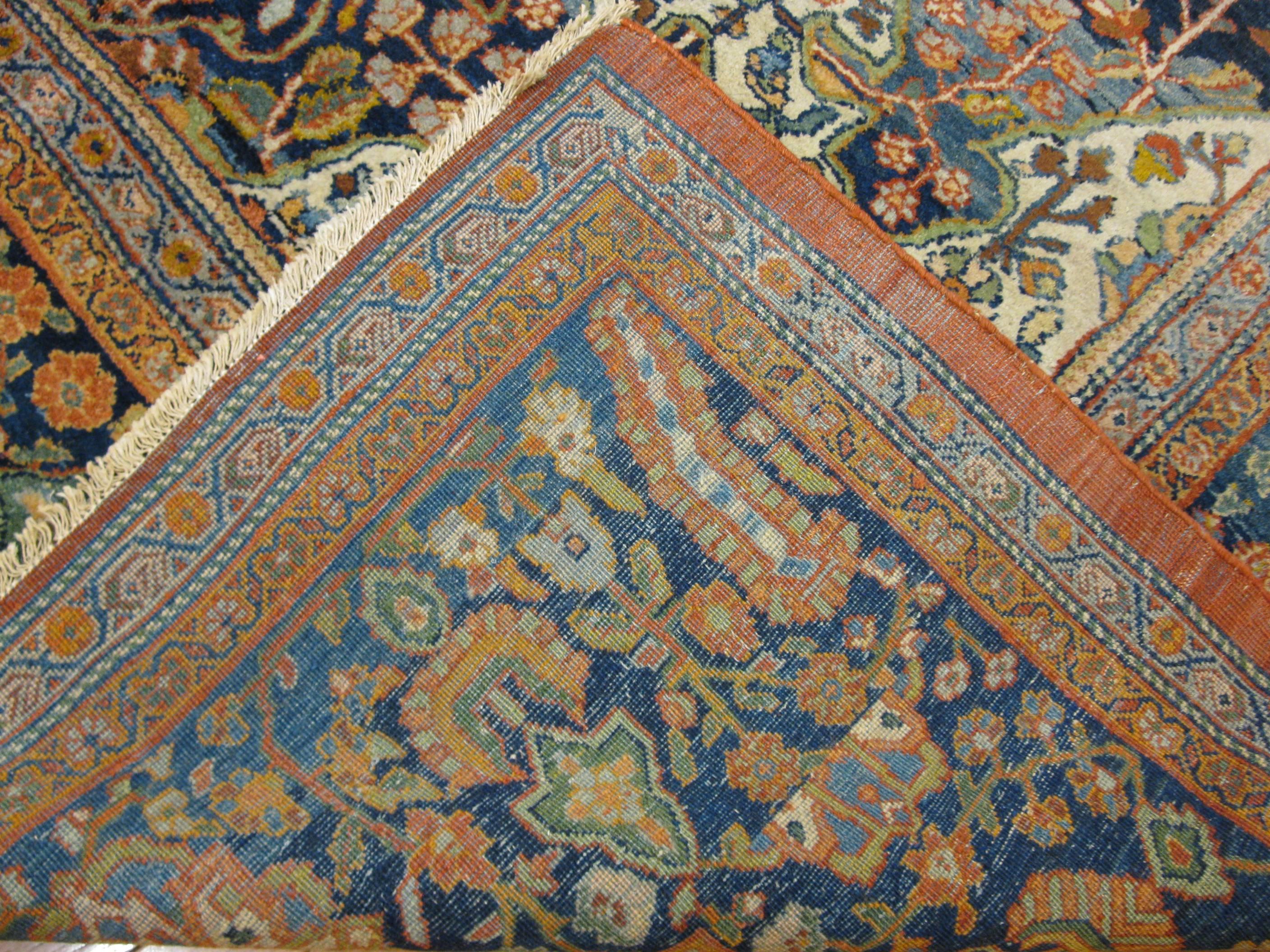 This rug is a fantastic example of the later antique Persian Sarouk Farahans. It is in great condition. The rug measures 10' 6'' x 14' made with fine wool.