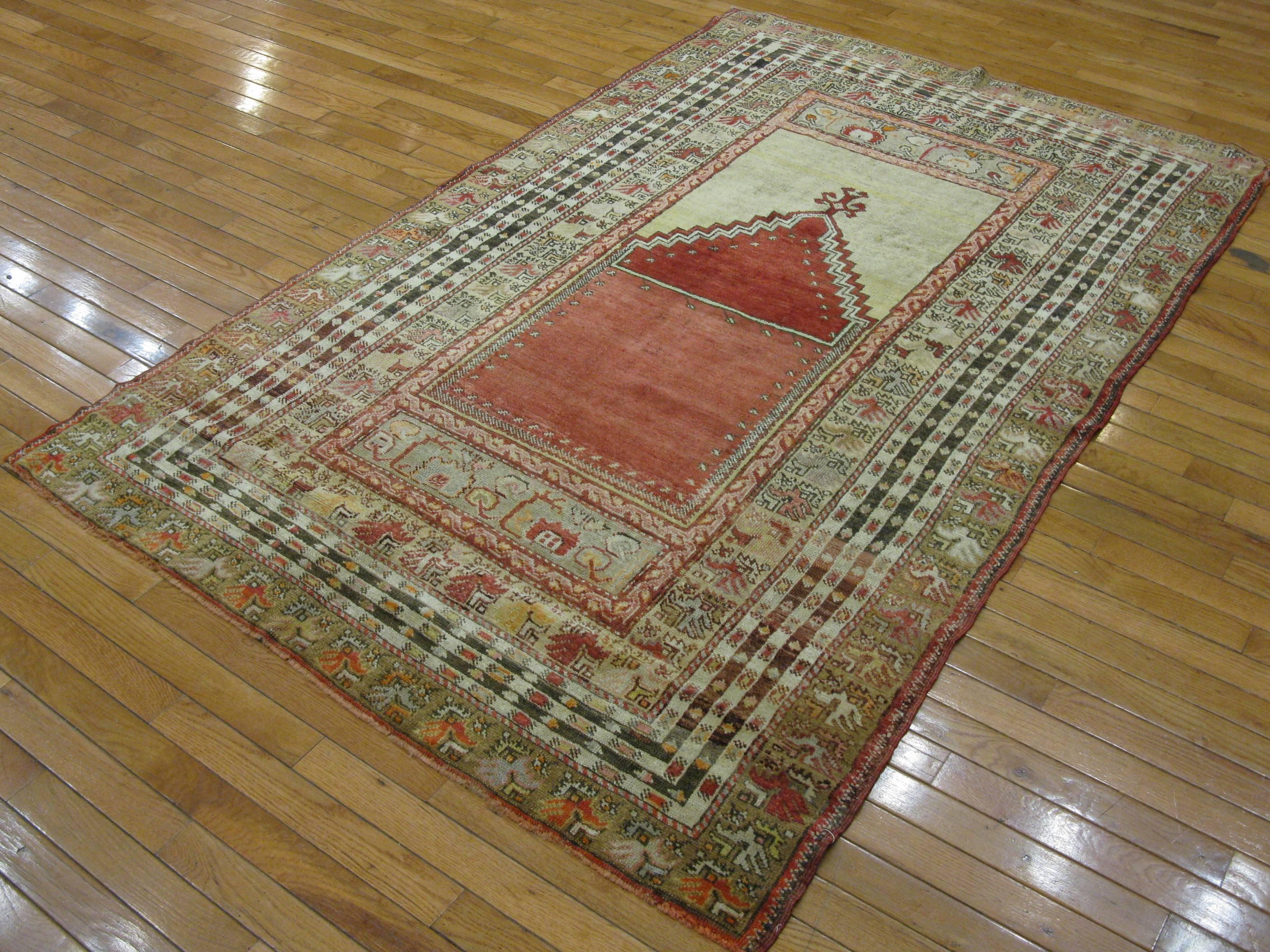 20th Century Small Hand Knotted Wool Turkish Rug In Red Color Field For Sale