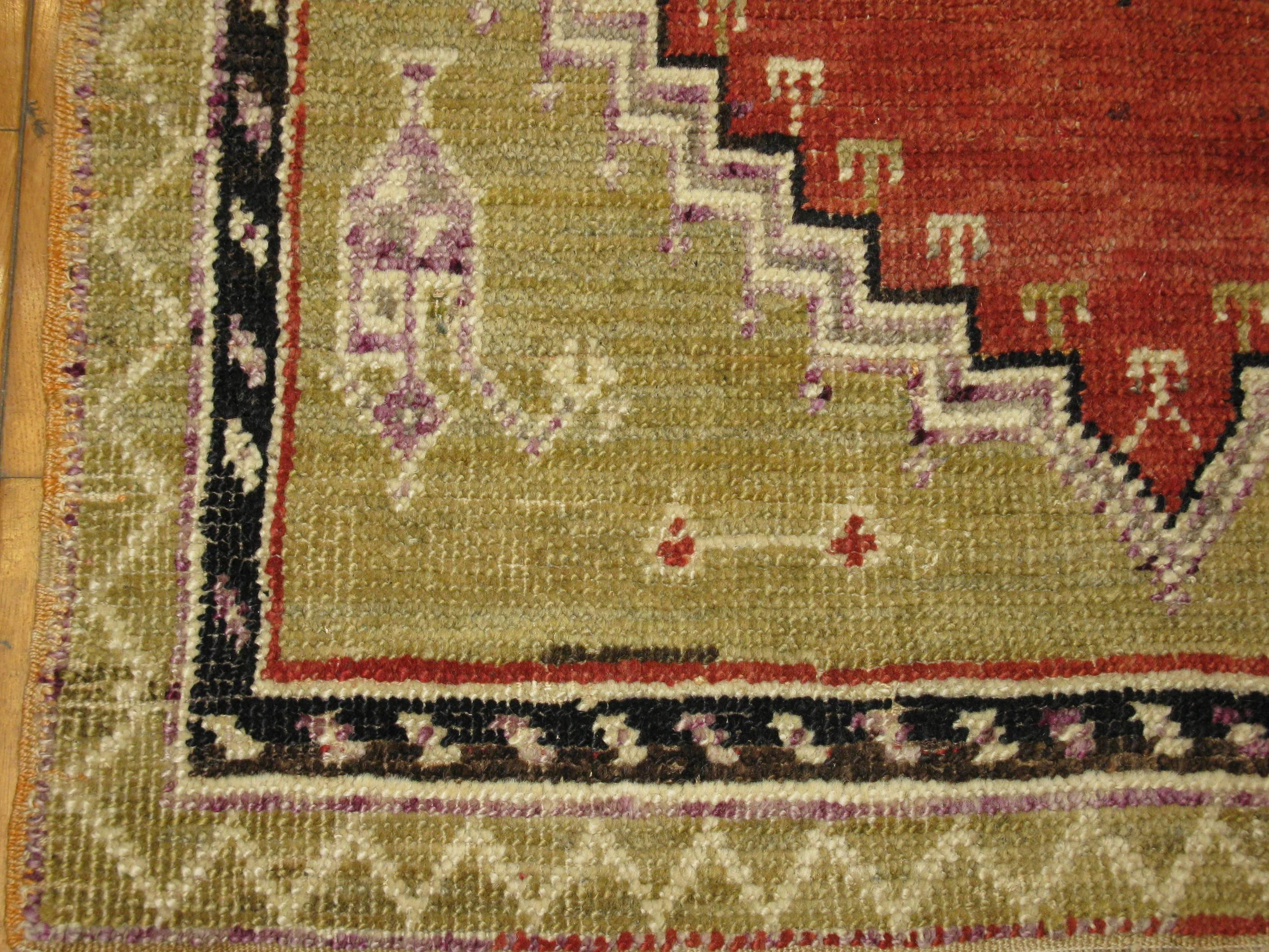 Small Vintage Handmade Wool Tribal Turkish Rug In Excellent Condition For Sale In Atlanta, GA