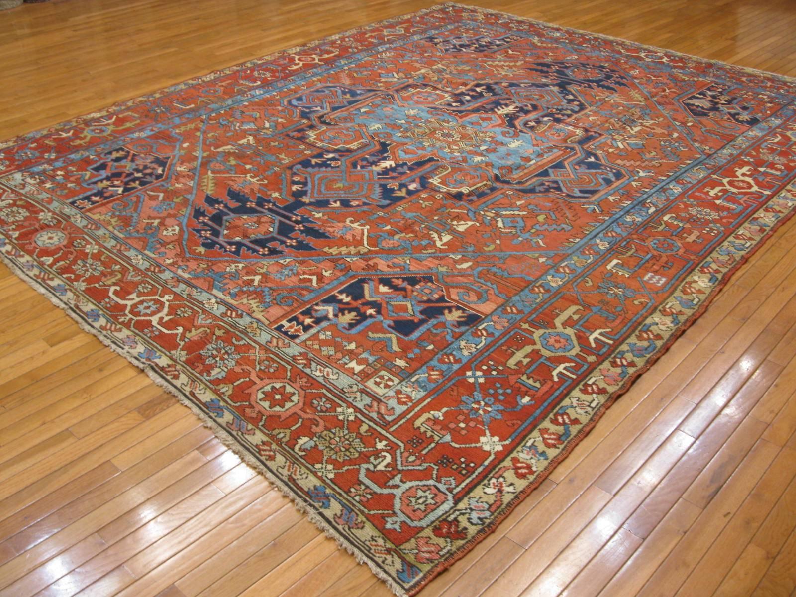 20th Century Antique Room Size Hand Knotted Wool Persian Serapi Rug For Sale