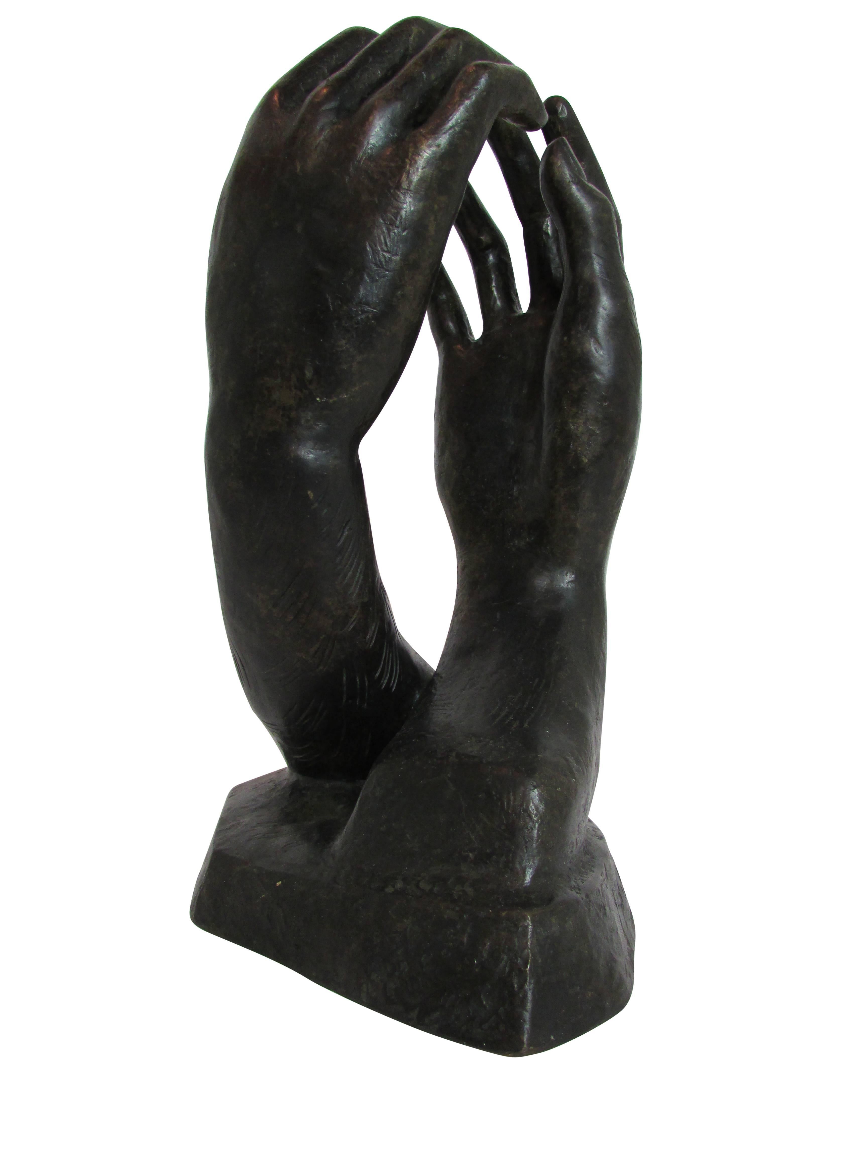 American Male and Female Bronze Clasping Hands Sculpture