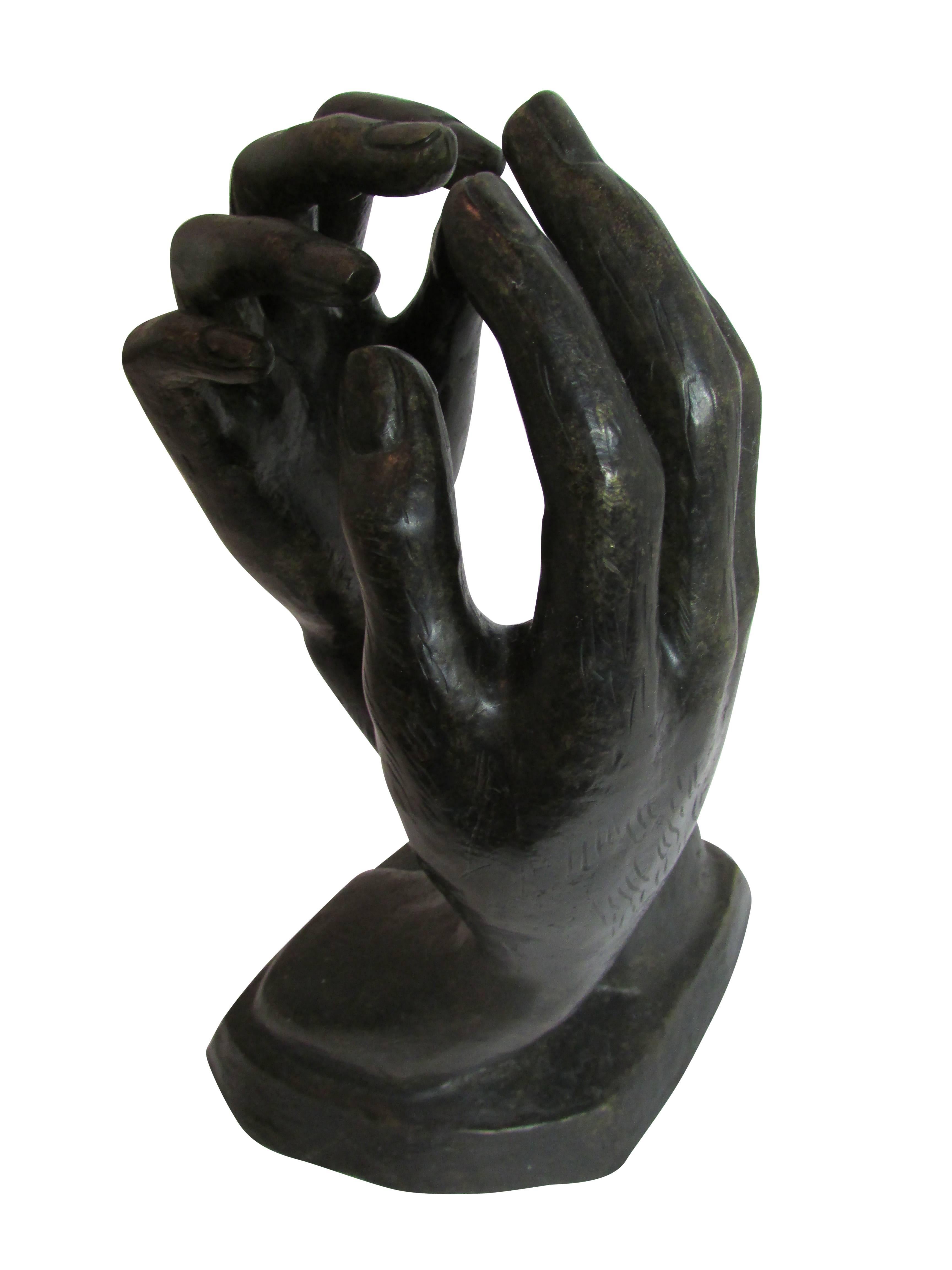 Cast Male and Female Bronze Clasping Hands Sculpture