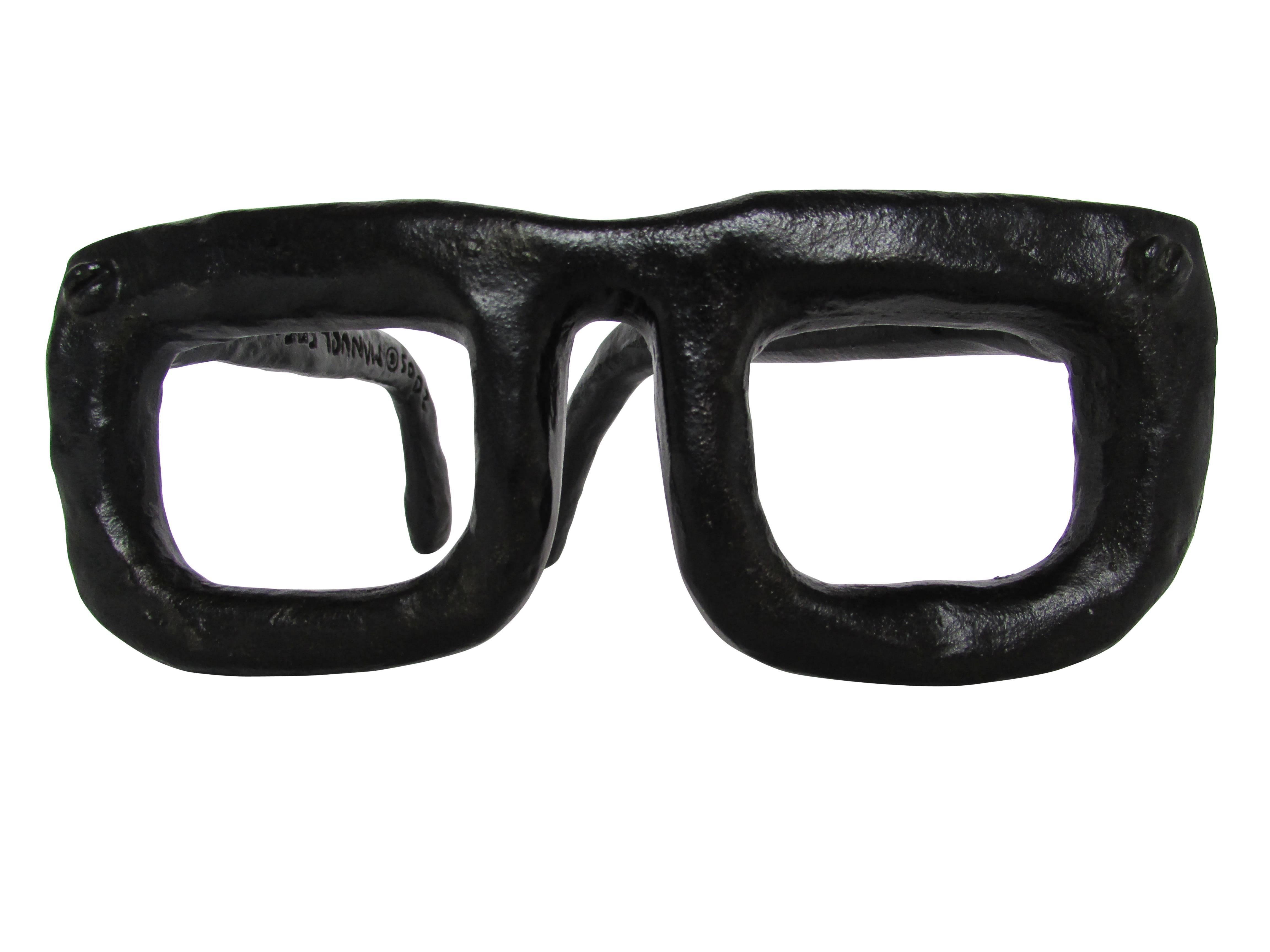 This is an original bronze sculpture of a pair of oversized eyeglasses by artist Manuel Ferreiro dated 2005 entitled 'La Mirada' ('The Gaze').