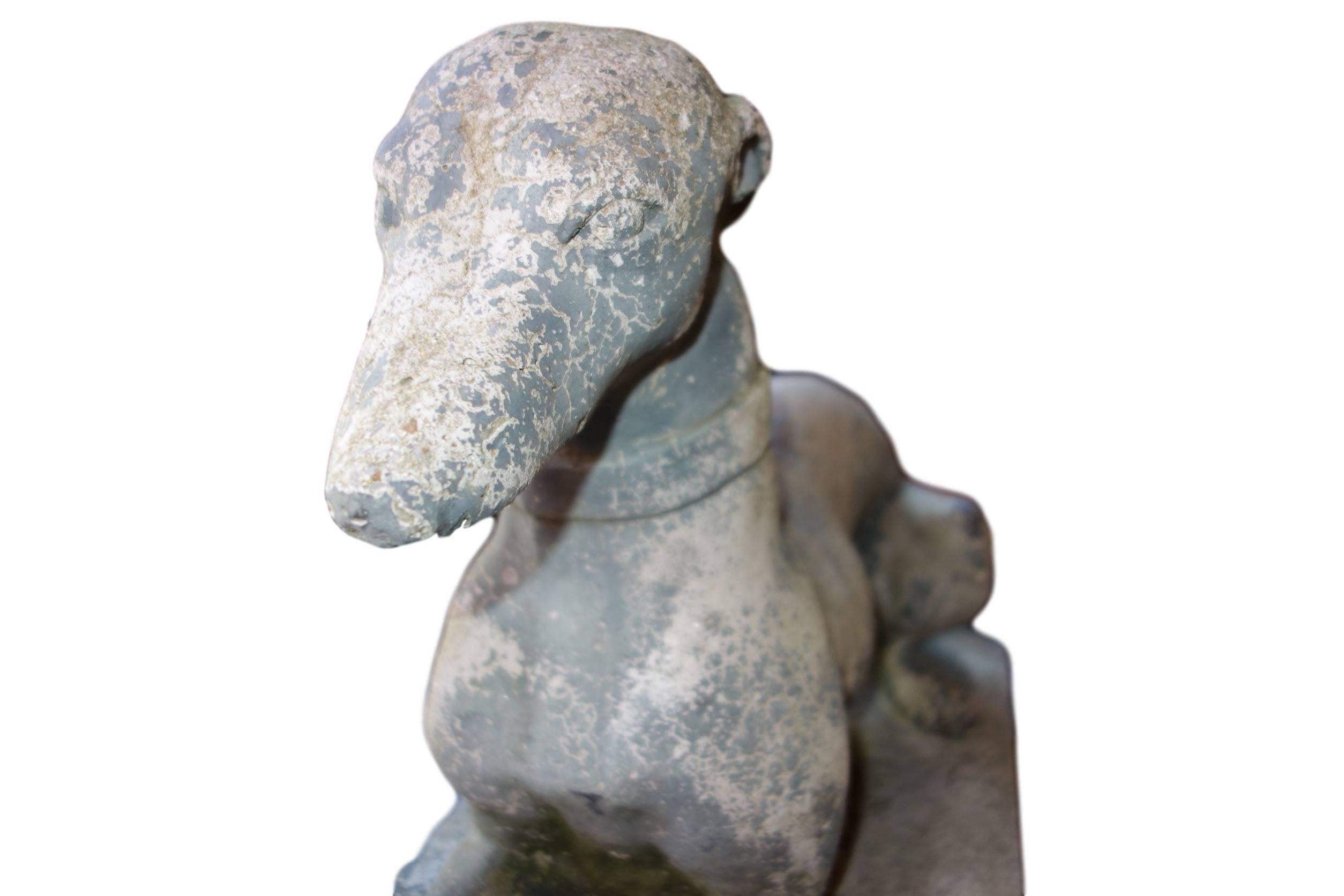 concrete whippet statue