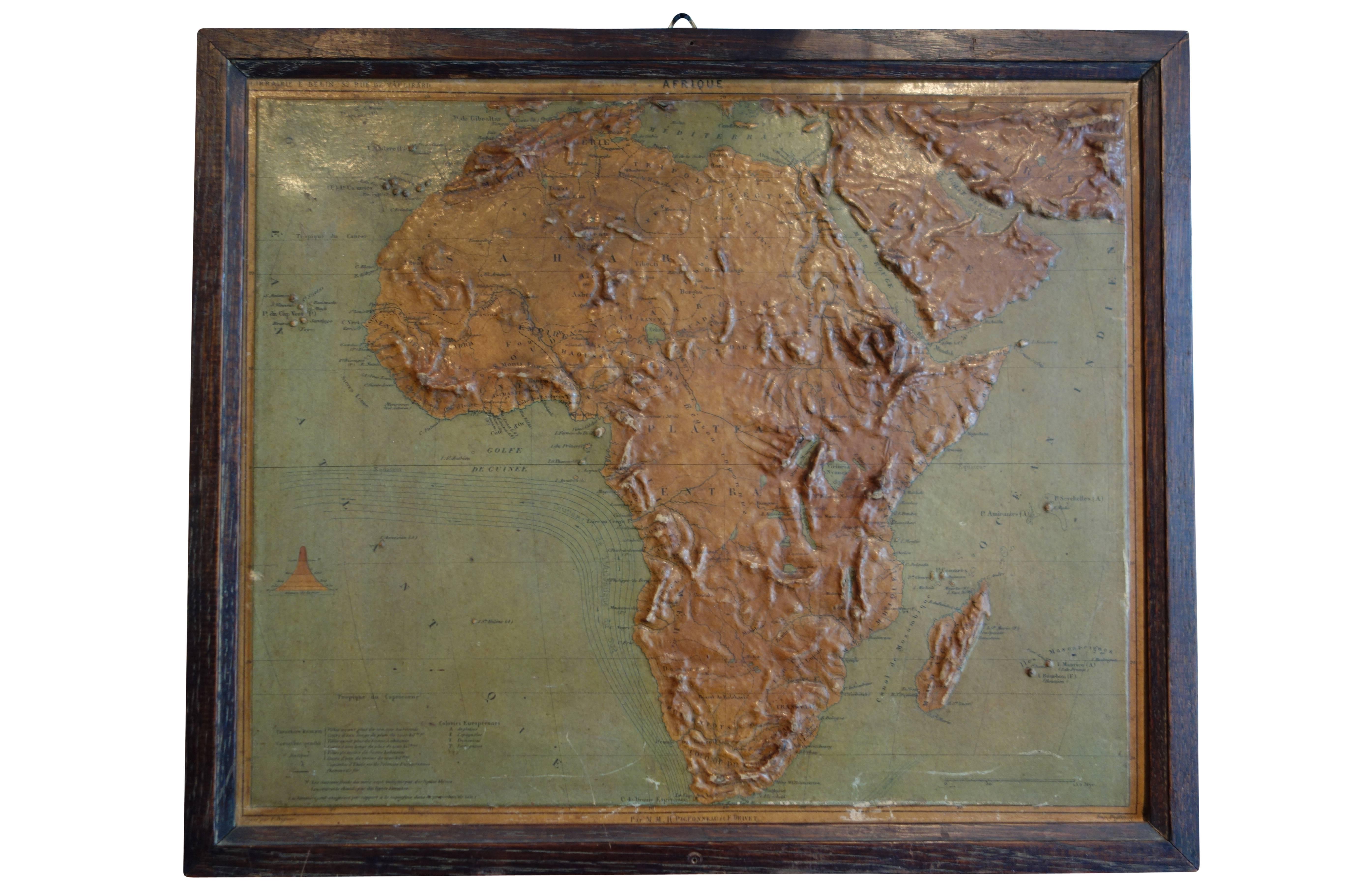 This is a wonderful set of five individually framed world relief maps from a school house in France, circa 1910.