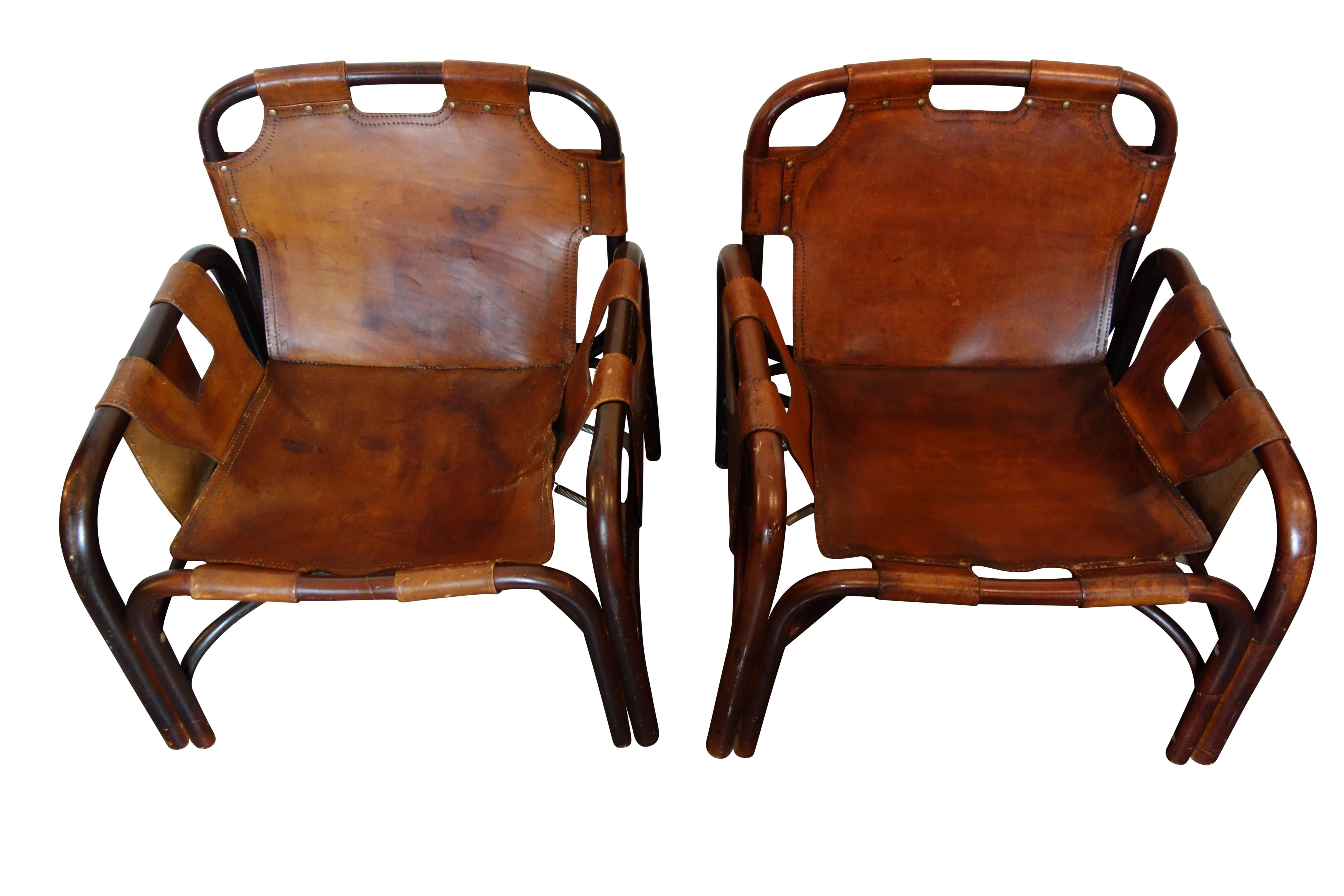 This is a beautiful pair of Italian leather safari chairs with bamboo frames in the style of Arne Norell, circa 1960.