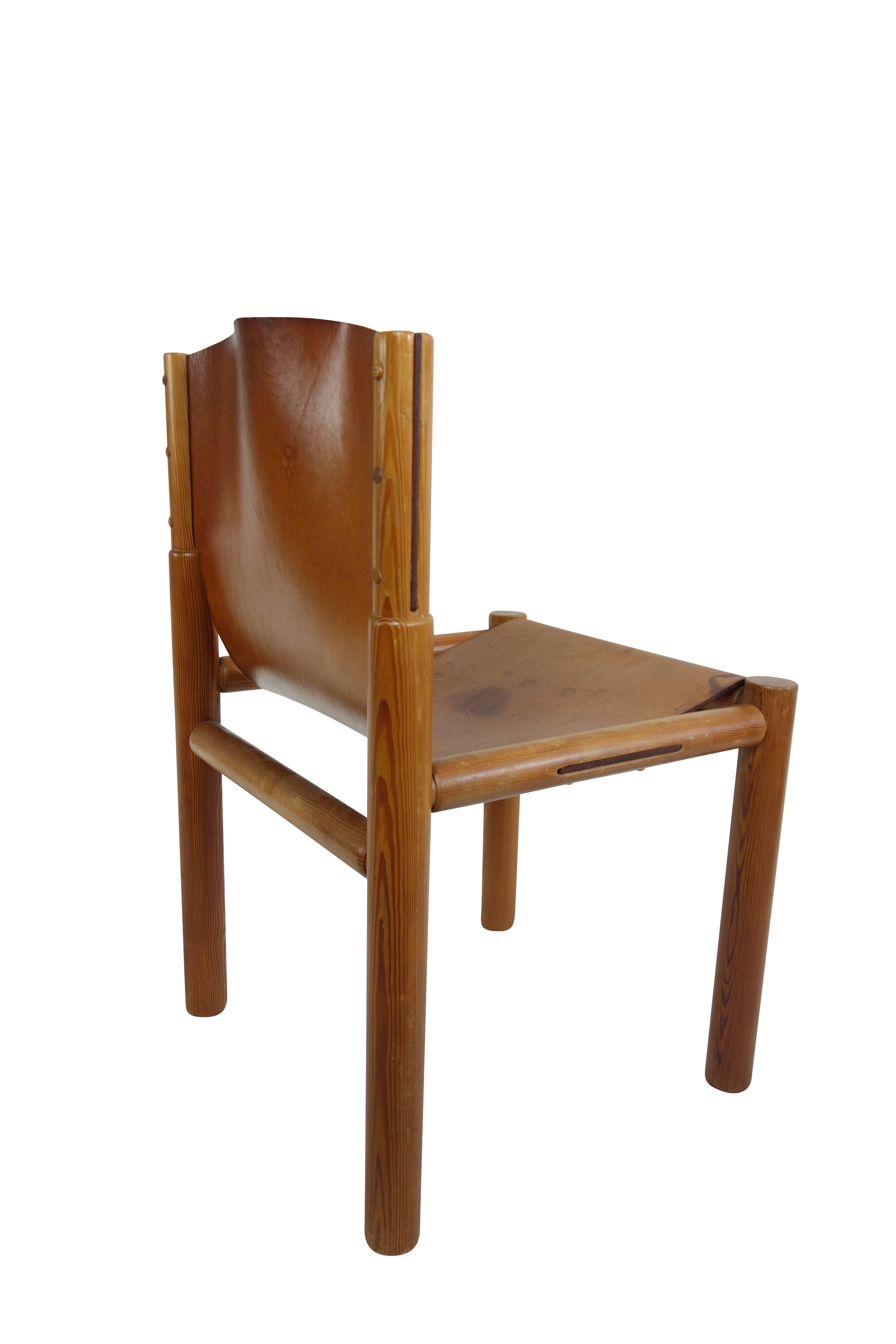 This is a beautiful set of Midcentury French leather sling seat dining chairs. 