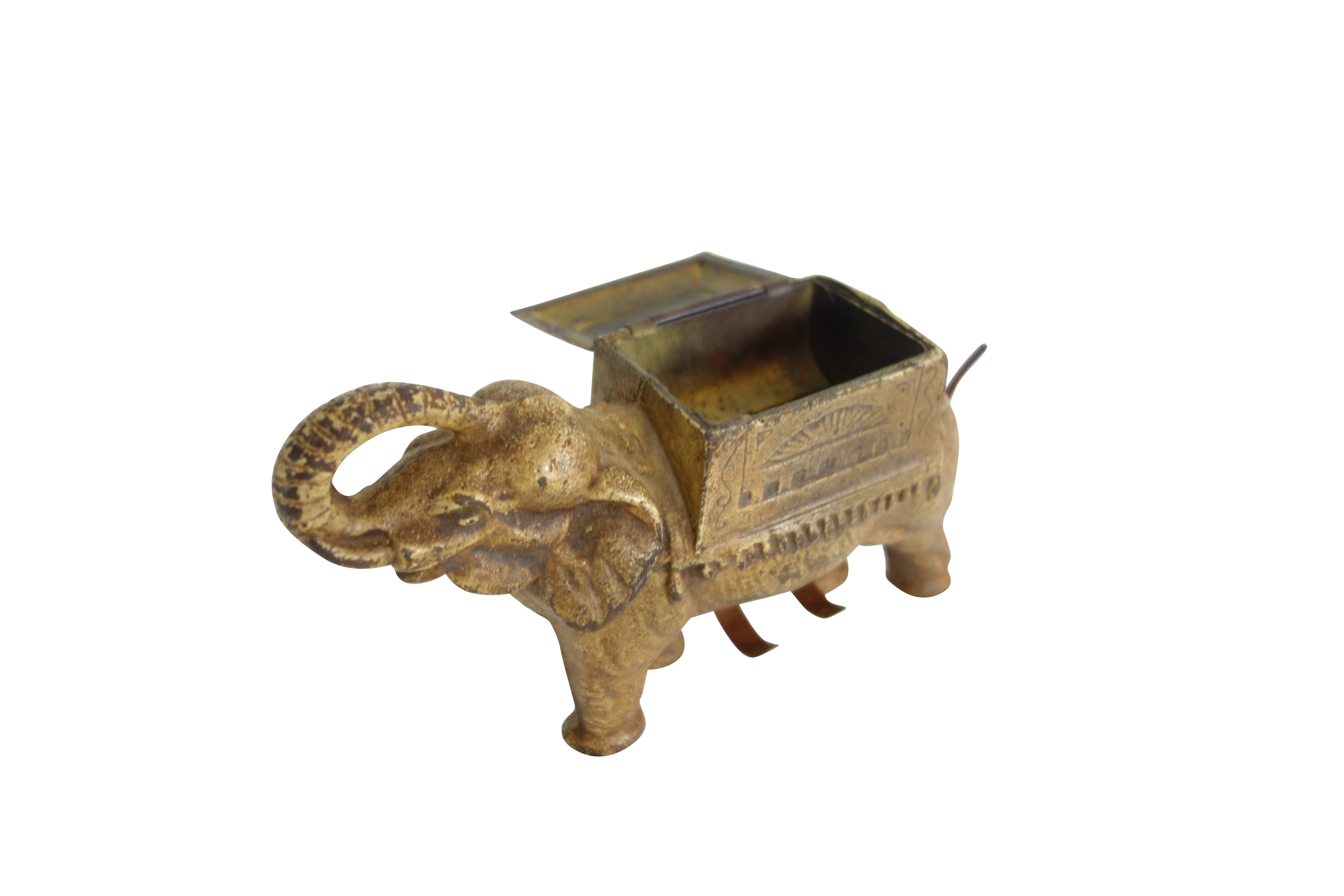 antique elephant cigarette dispenser