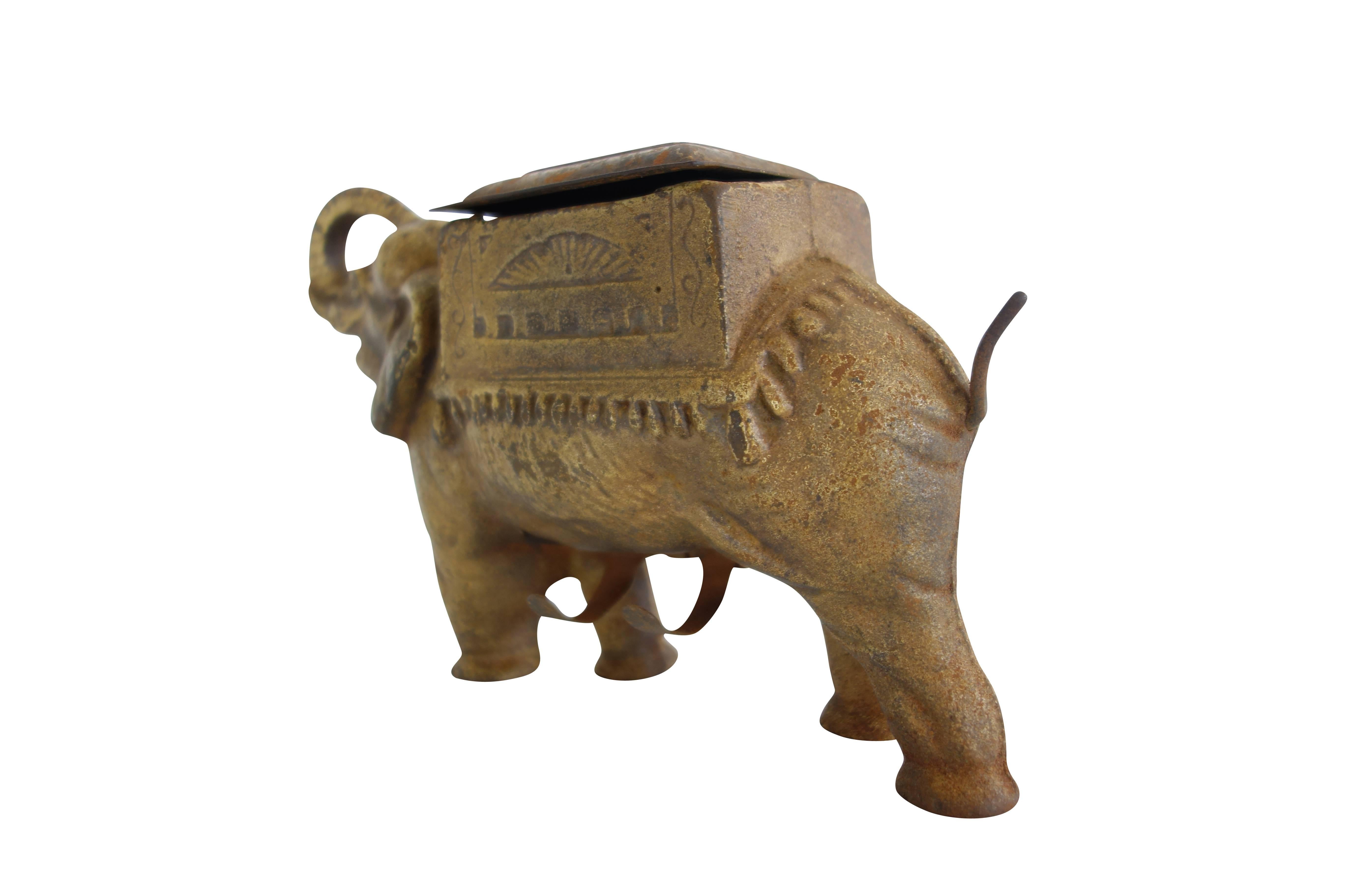 antique cast iron elephant cigarette dispenser