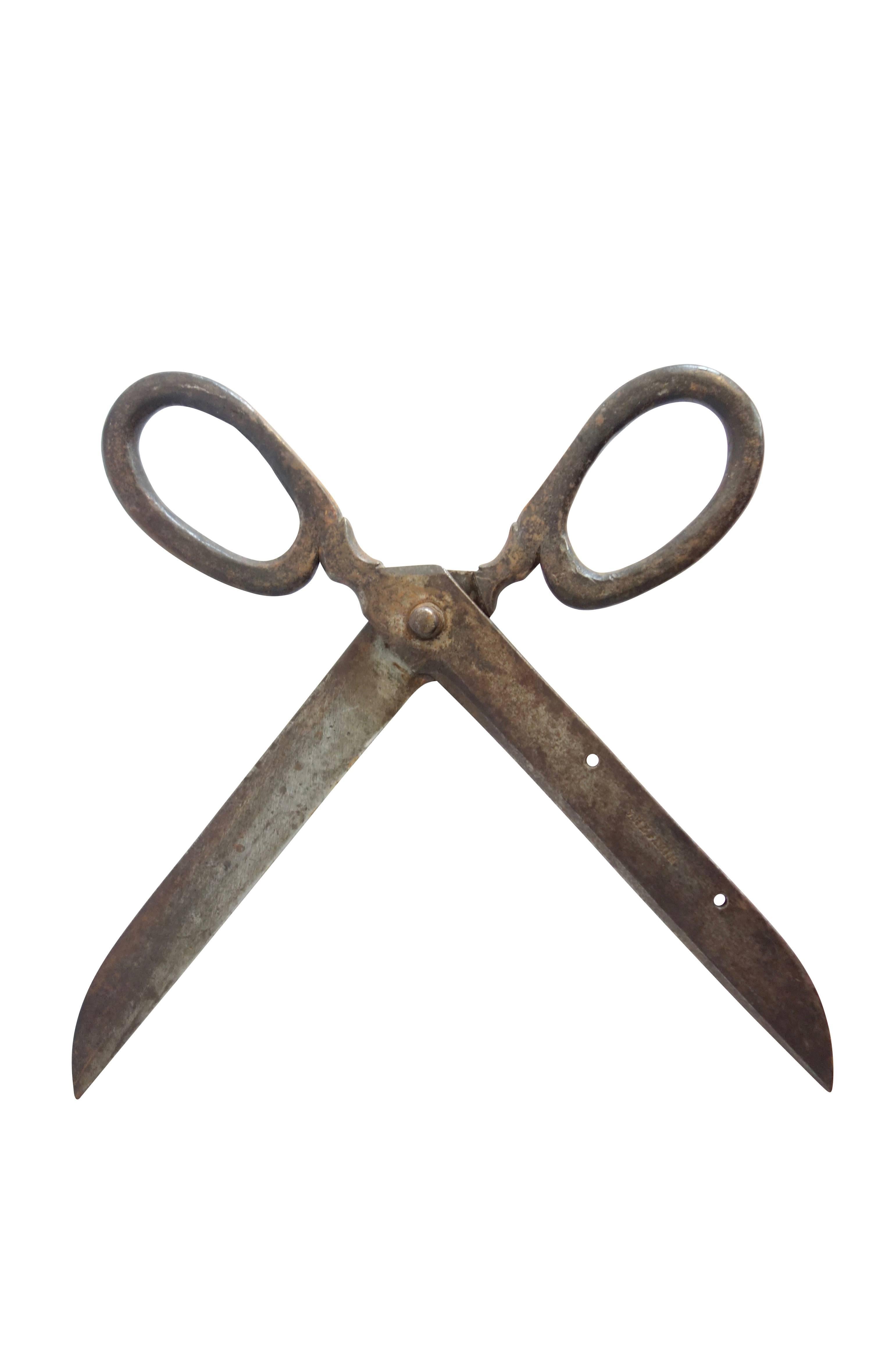 This is a pair of giant steel scissors stamped 
