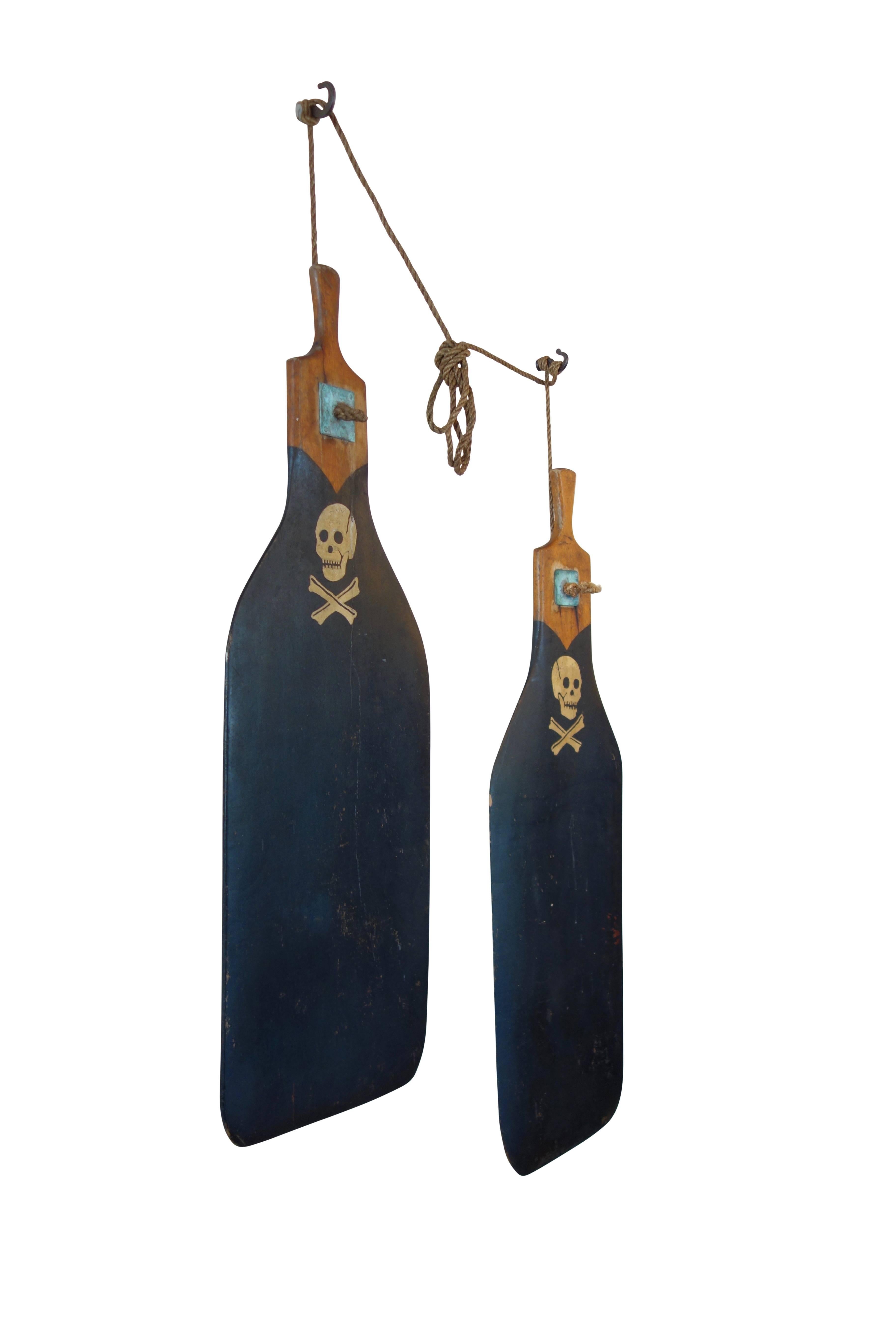 Folk Art Pair of Boat Rudders with Hand-Painted Skull and Crossbones, circa 1930