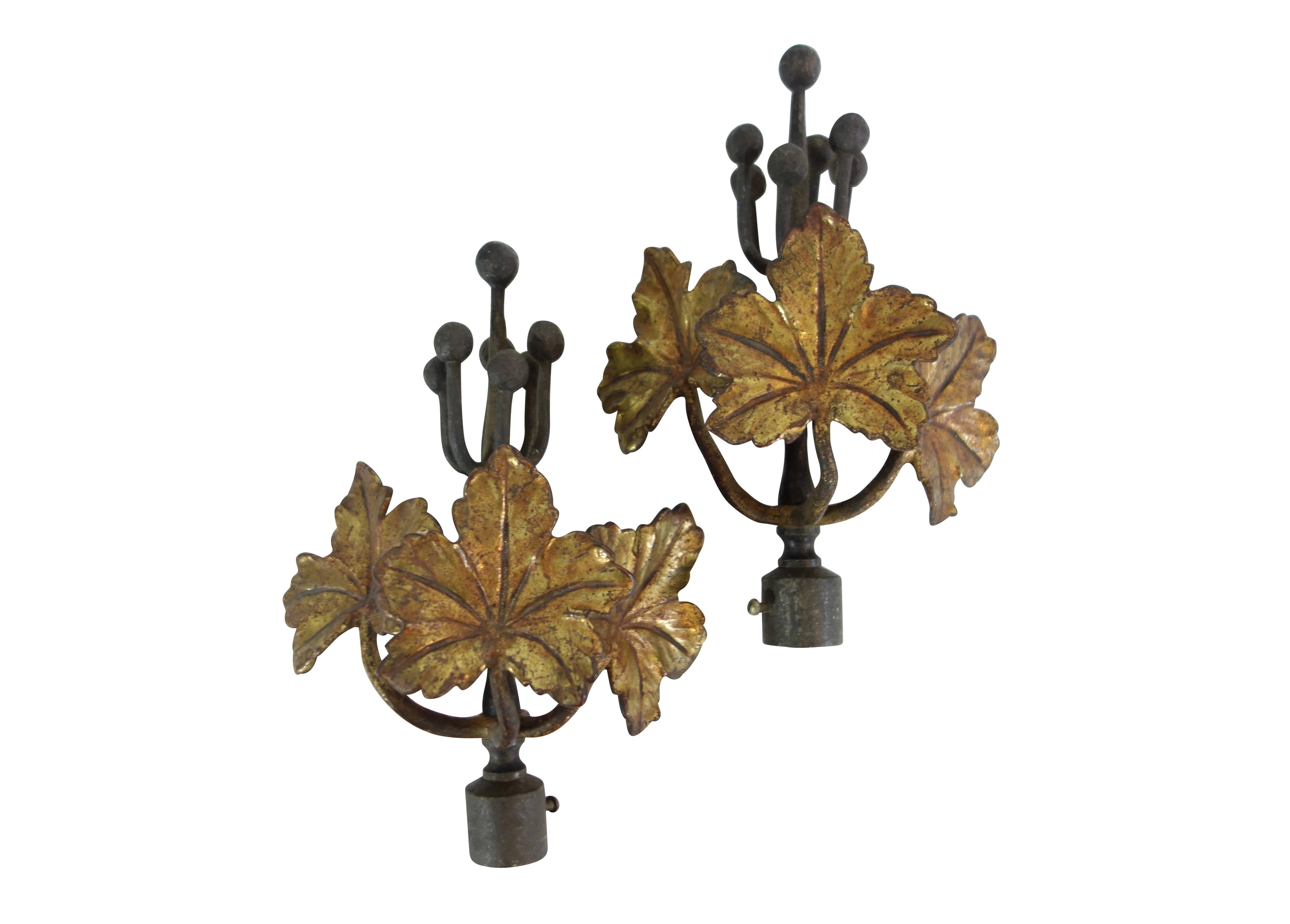 This is a beautiful set of hand-forged steel and bronze ivy curtain hardware. The set includes two curtain tie backs, and two curtain rod adornments. 

Measure: Tie back pieces (top) 6" wide x 5" deep x 9.5 " high

rod adornments