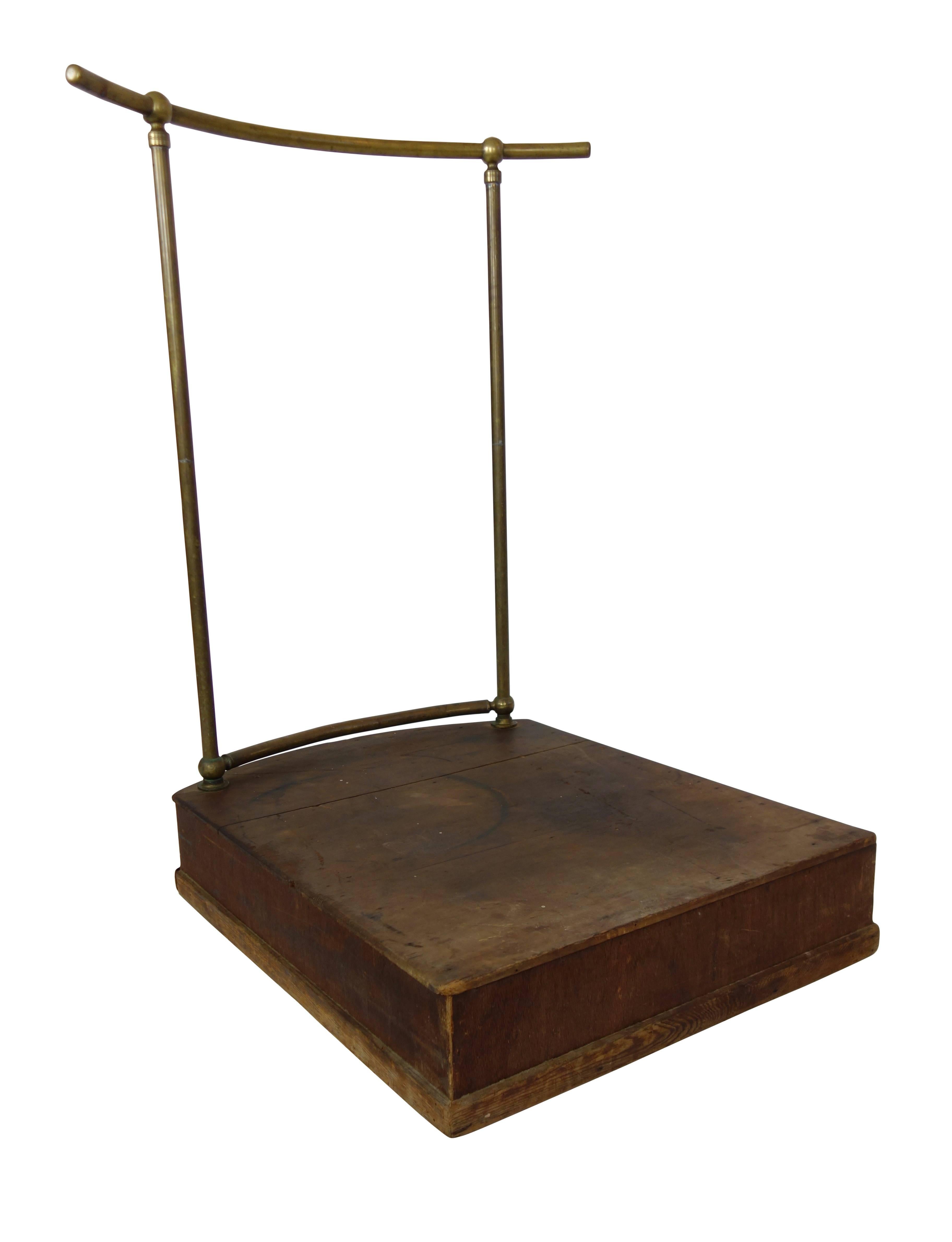 This is an early 20th century conductors podium with nickeled brass bar.
