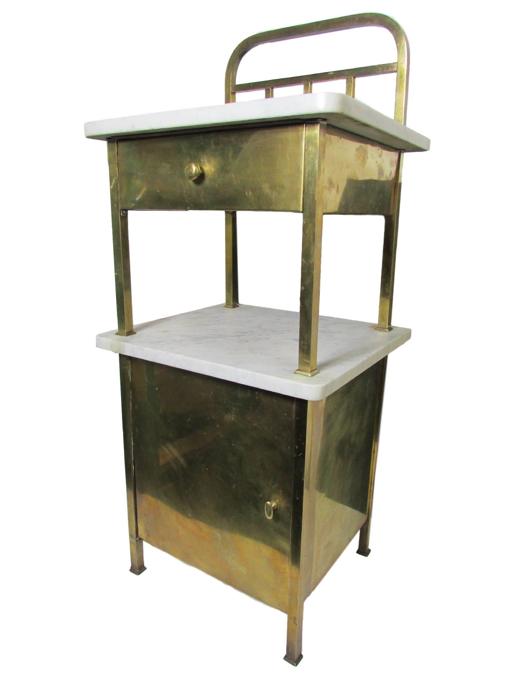 Brass and marble side table with drawer and storage cabinet circa 1940.