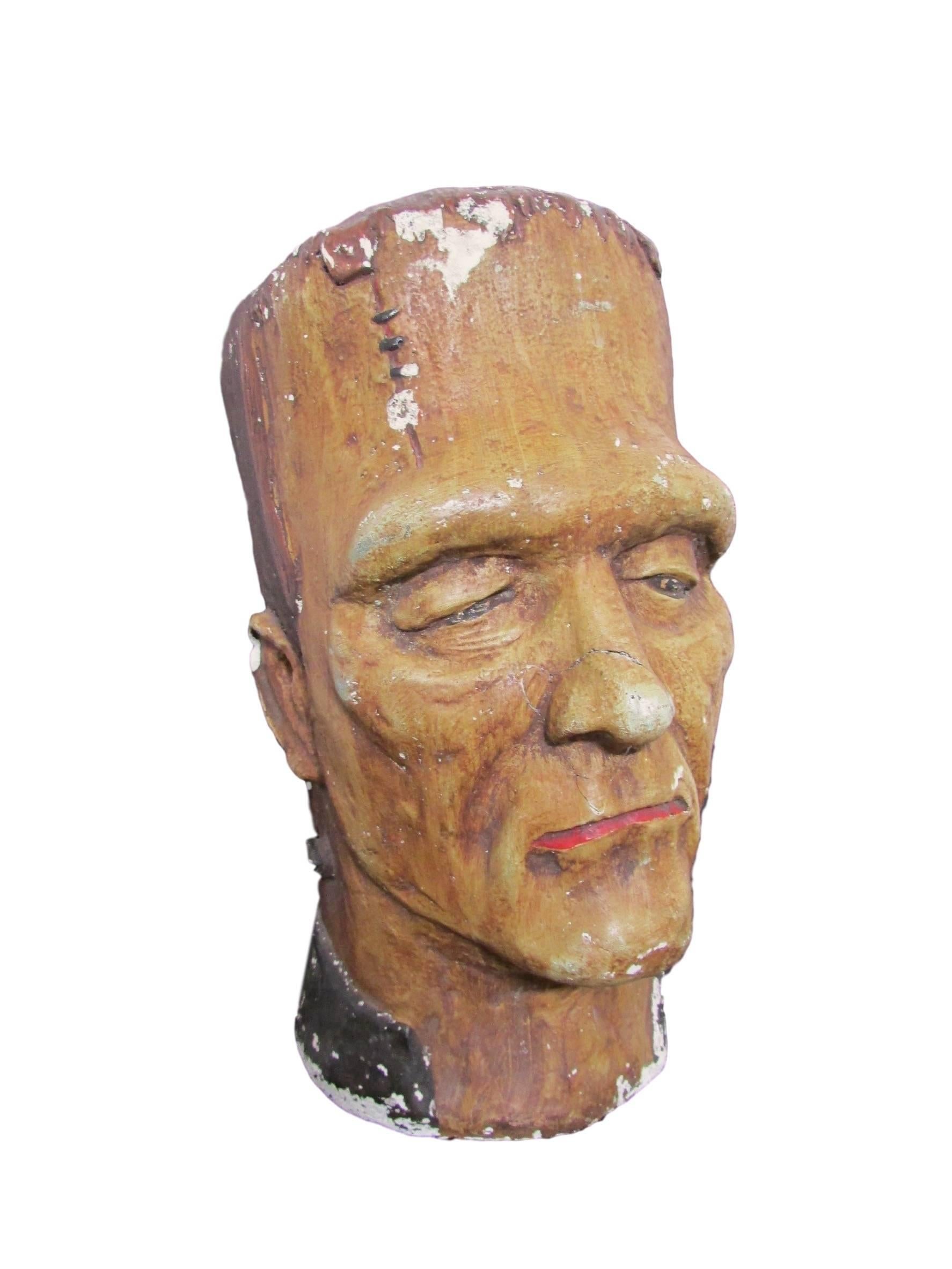 This is a legit scary chalkware bust of Frankenstein circa 1930 used by a theater as an advertising prop. 