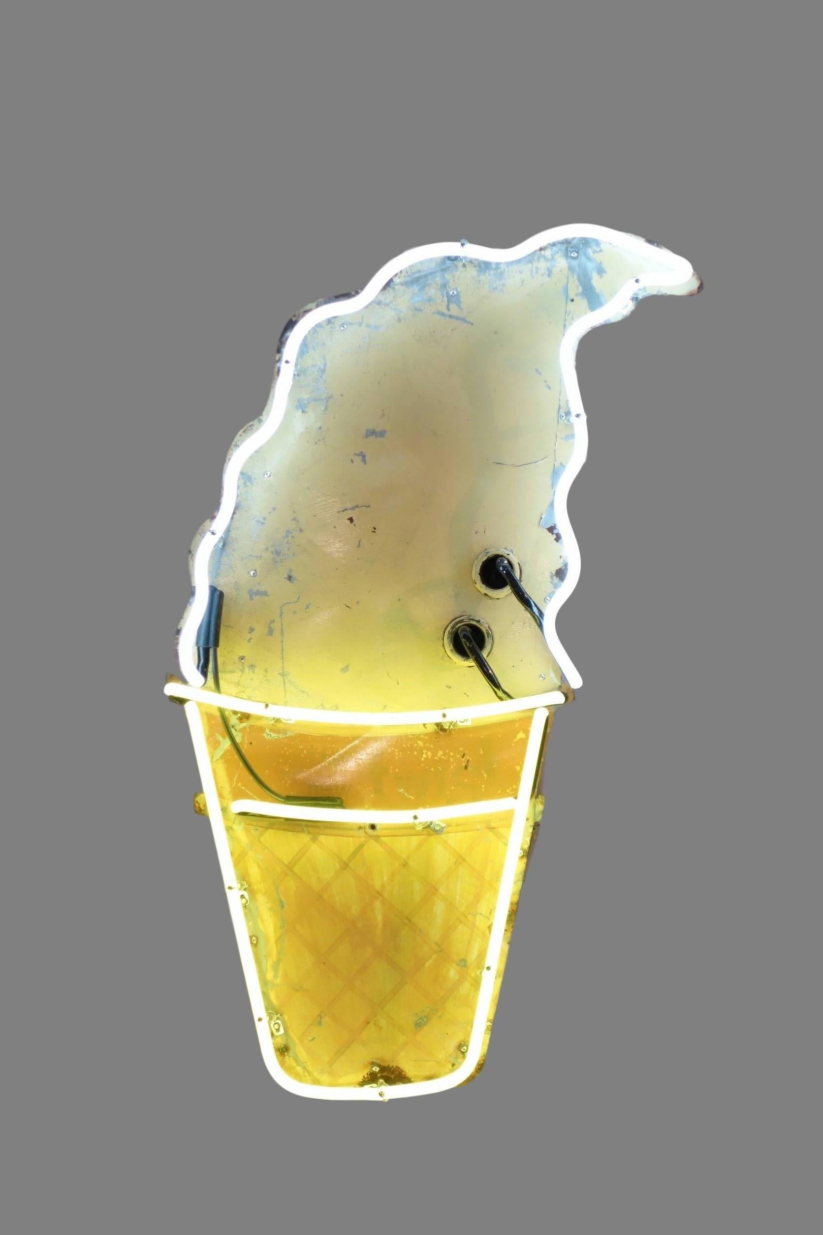 This is a hand-painted neon ice cream cone sign.