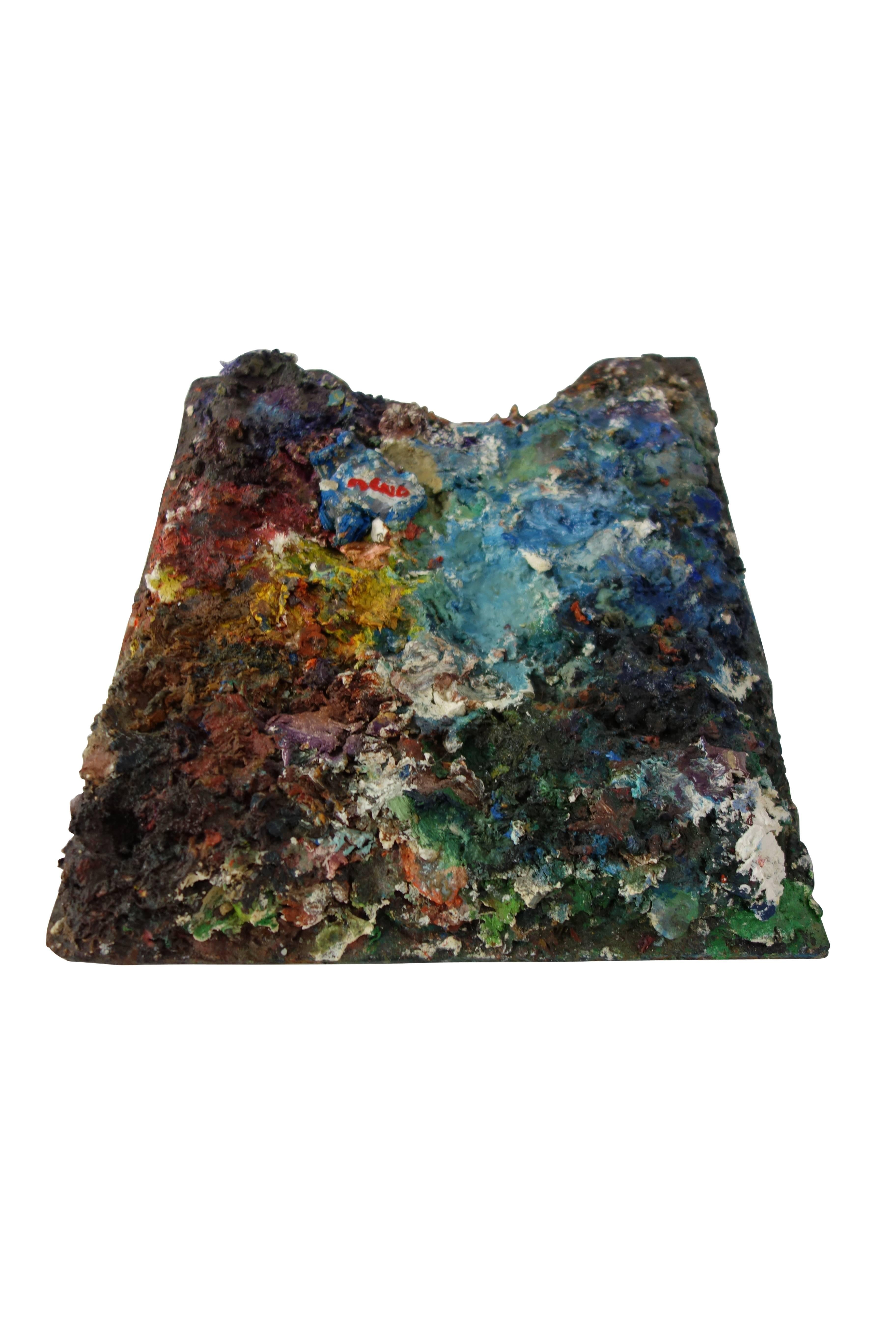 This is a colorful artist’s paint palette with years of paint build up giving it fantastic texture, circa 1970 signed 