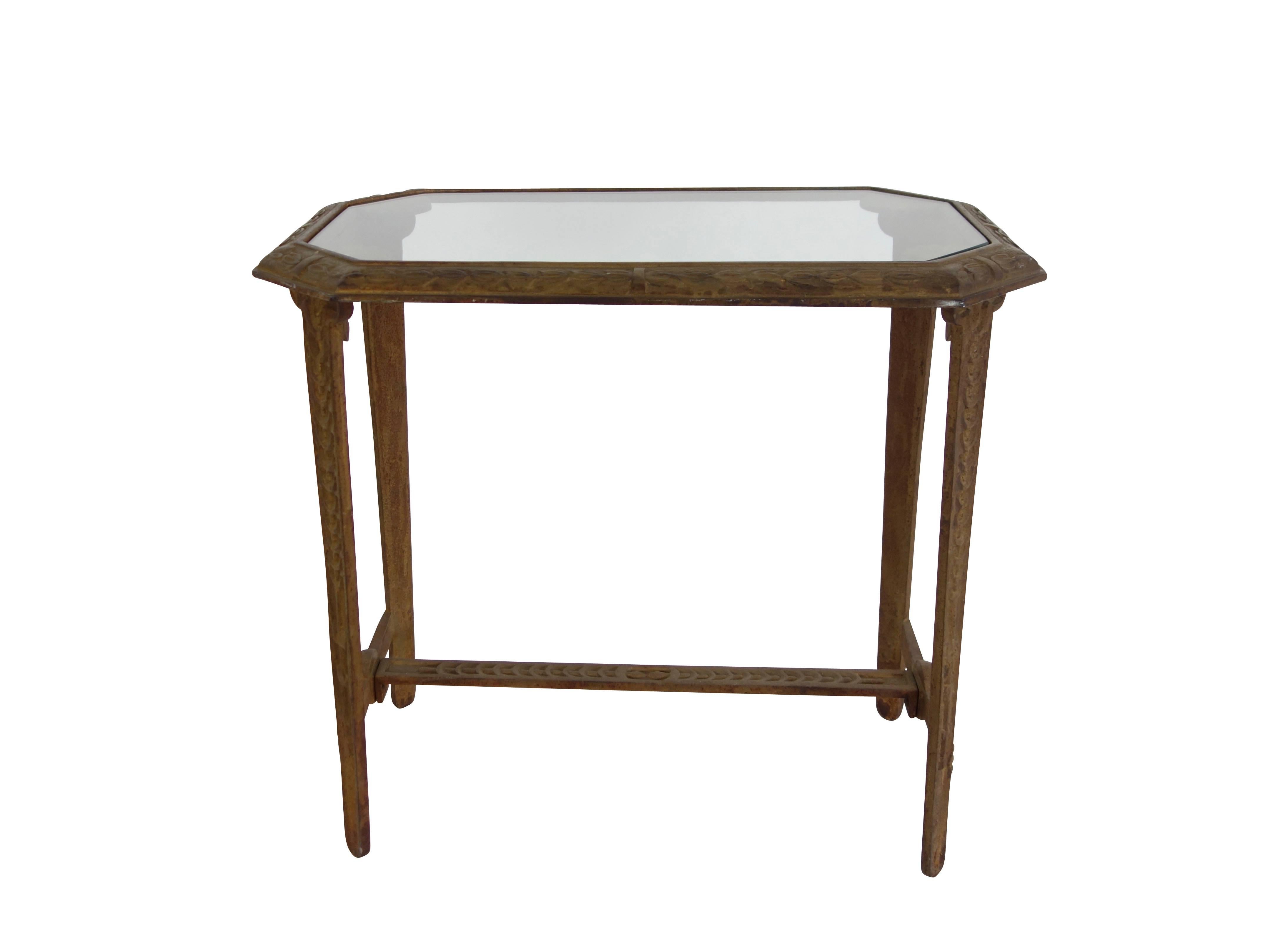 This is a wonderful Art Deco cast iron and glass side table.