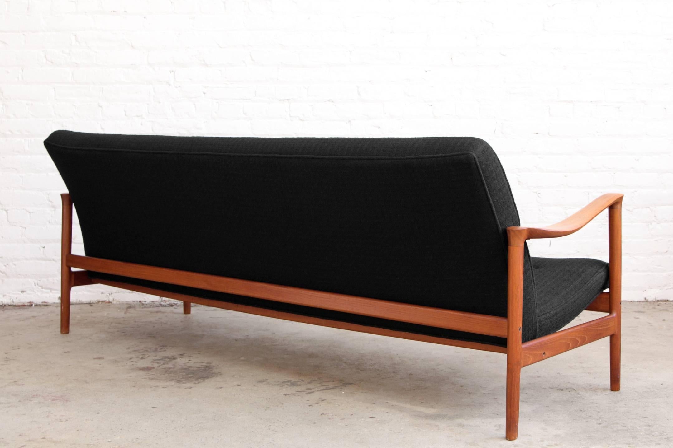 Scandinavian Modern Sofa by Torbjørn Afdal, Norway Teak and Black Wool