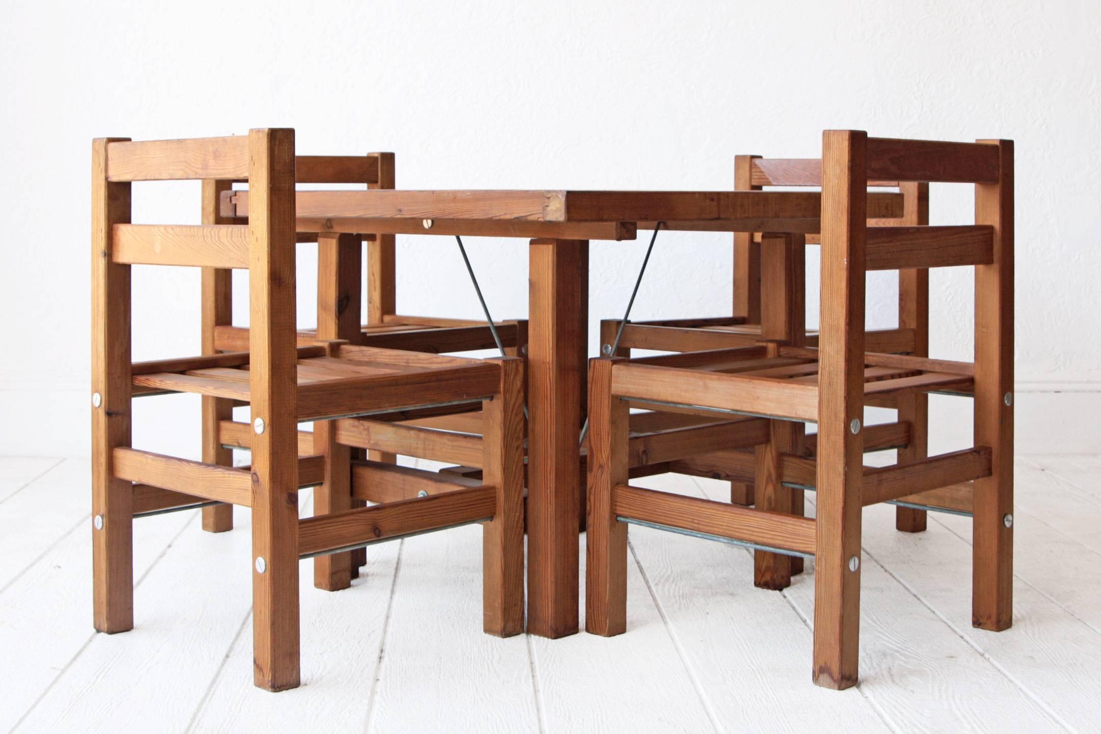Solid redwood patio set by Elsa Stackelberg for Fri Form, Sweden. Diminutive dining table with hole for umbrella and four chairs. Custom cushions can be made upon request for an additional price.
Measures:
Table: 31.5