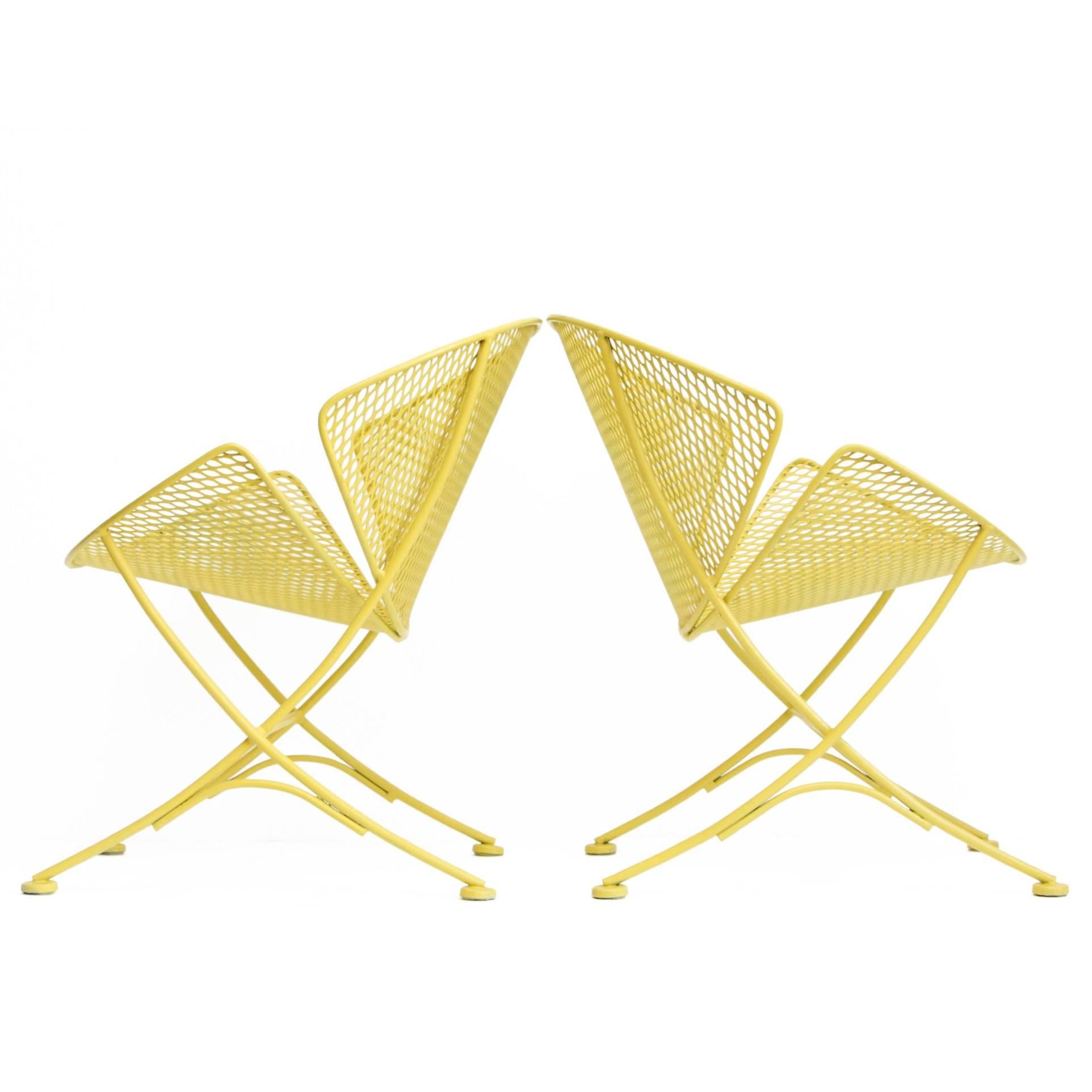 Maurizio Tempestini for Salterini orange slice / clamshell patio chair pair. Mesh + wrought iron, painted yellow. Minimalist design ideal for outdoor or indoors.