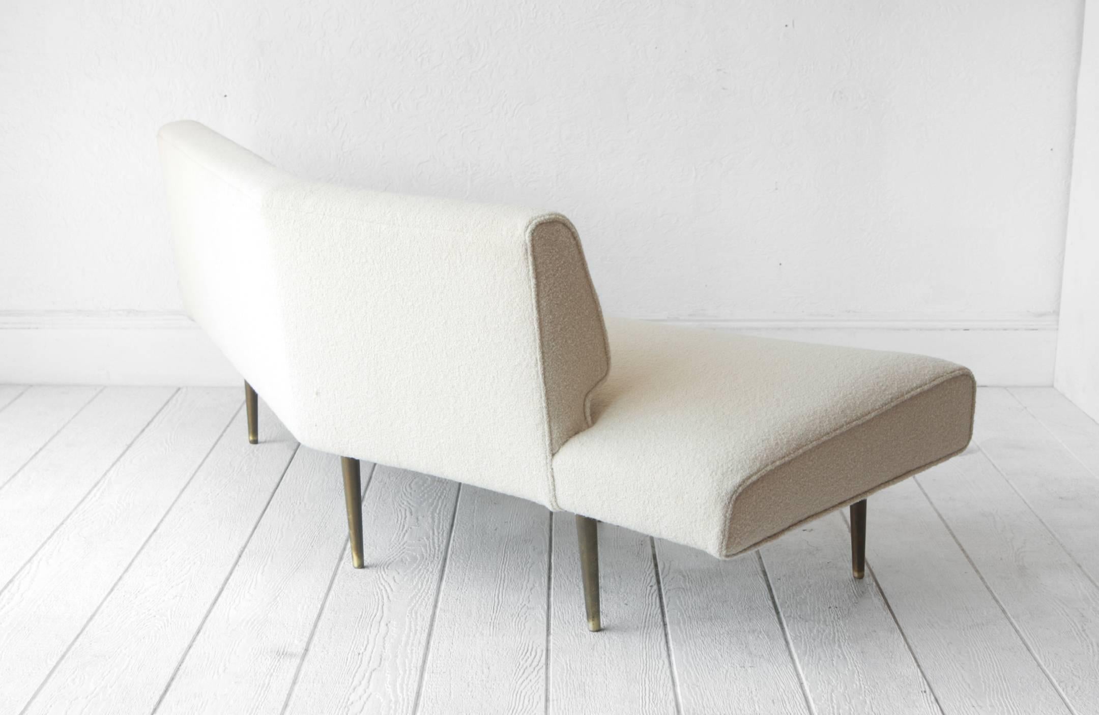 A "Channel Back" sofa by Edward Wormley. Reupholstered in a dense cream wool. An early Wormley design from 1947 model #4757. Solid brass legs, the frame inside is solid rosewood.