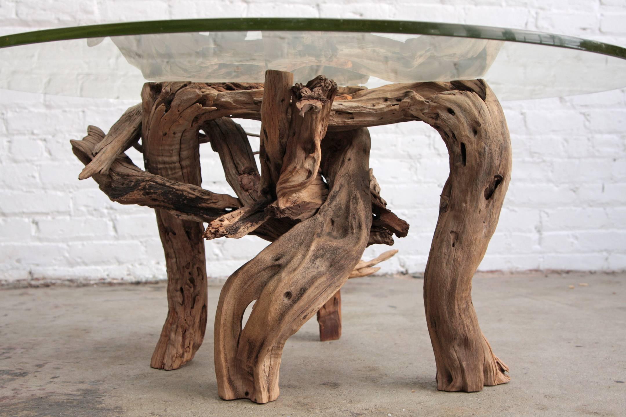 round driftwood coffee table with glass top