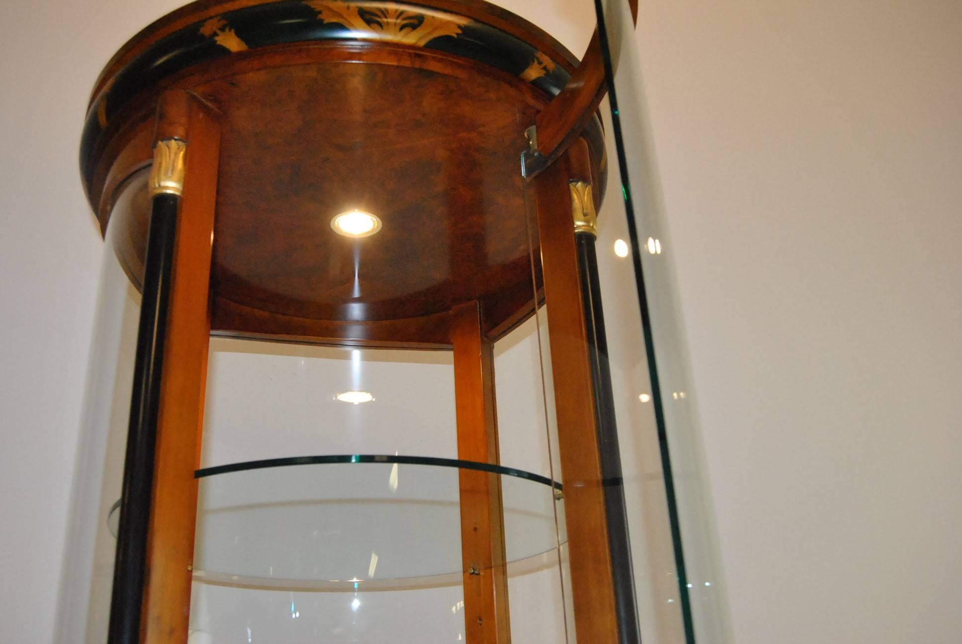 round glass curio cabinet