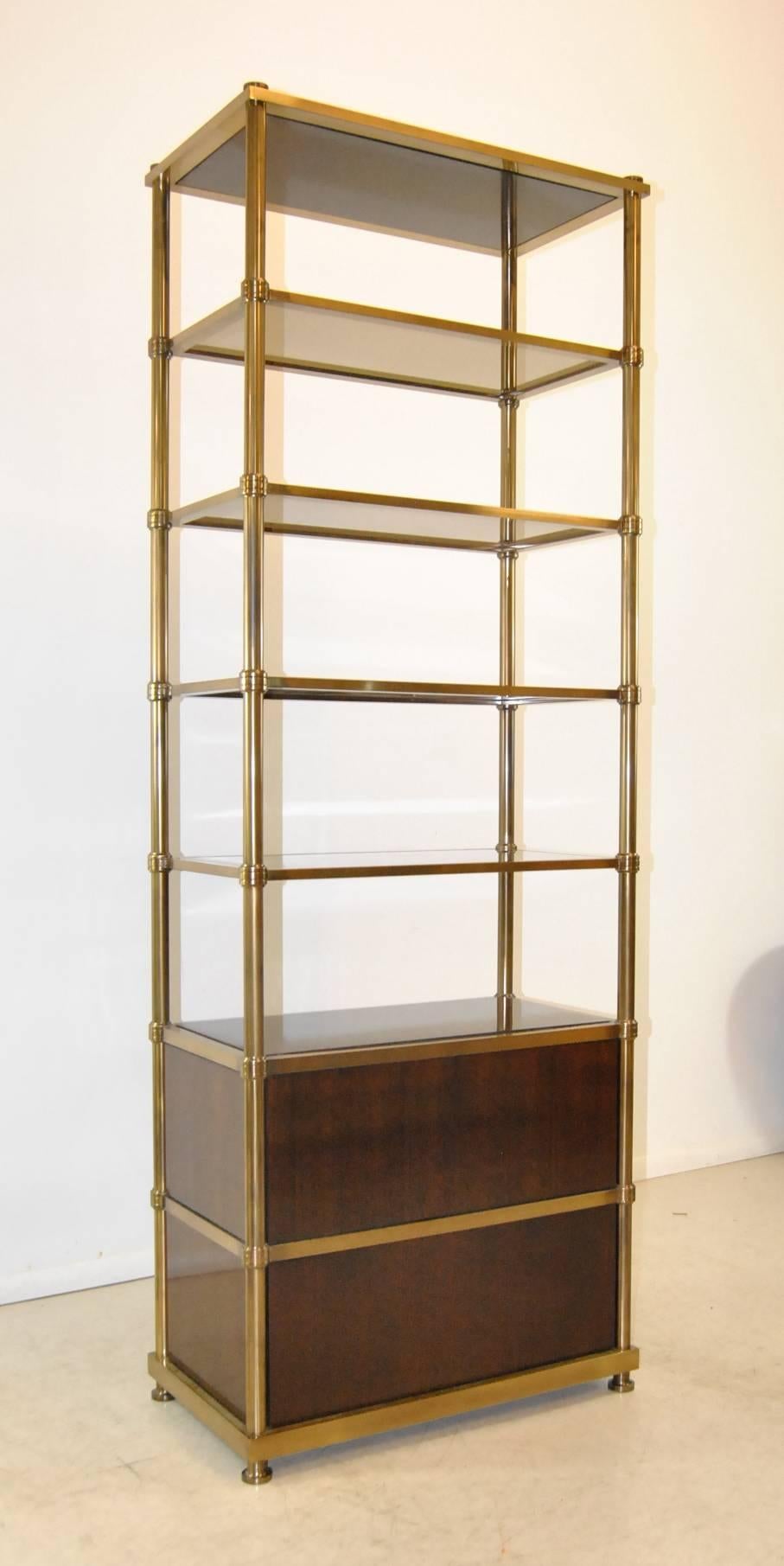 The etagere exemplifies the graphic Minimalist approach which meets designer Laura Kirar's goal of beautiful furniture that is also functional. The étagère features a brass frame finished in polished bronze. The top is American walnut. The étagère's