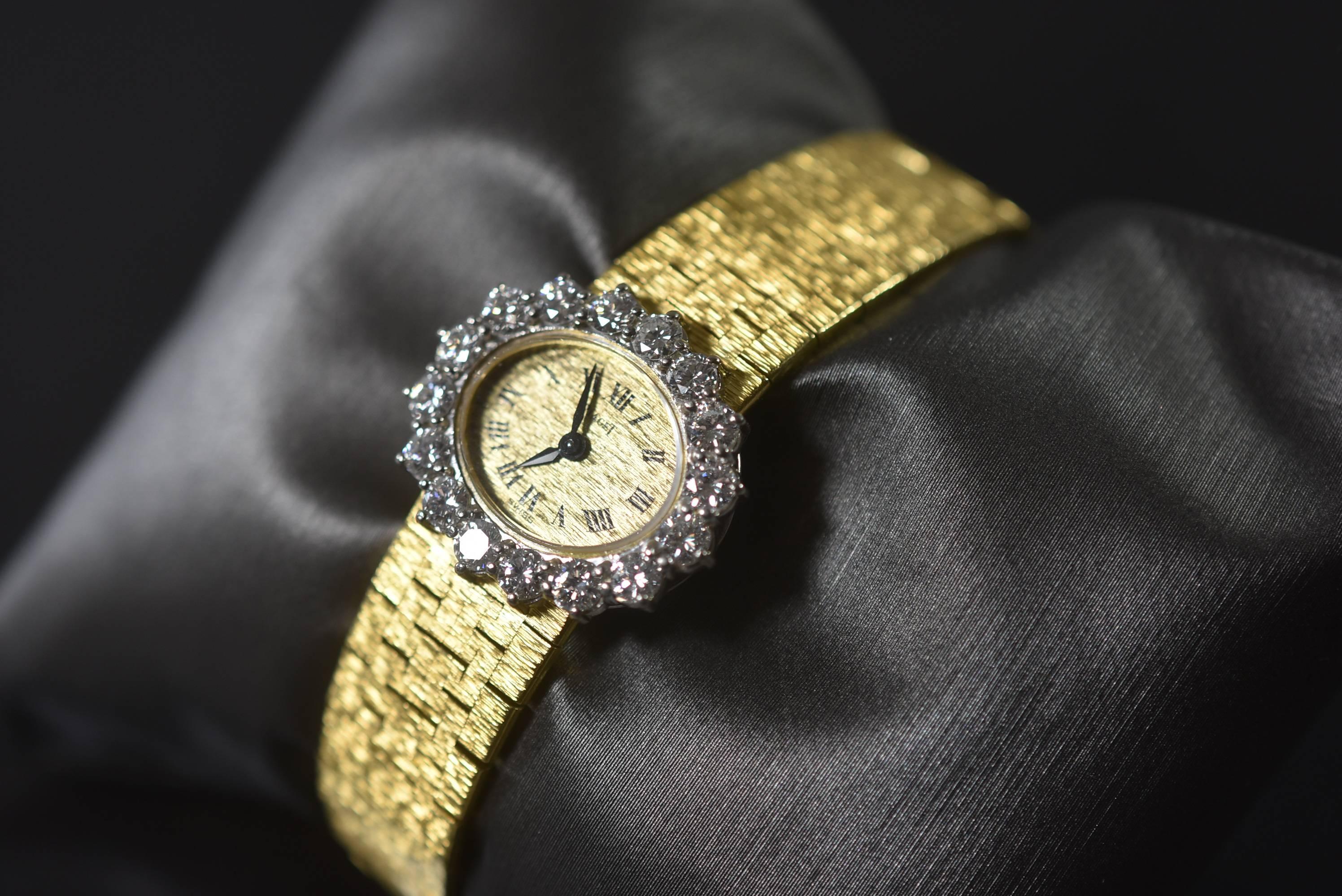 A stunning 18-karat Piaget diamond wristwatch. There are 2 carat of diamonds, VVS - F color. It has been serviced. Very light wear. It has a small band that is 6 1/16