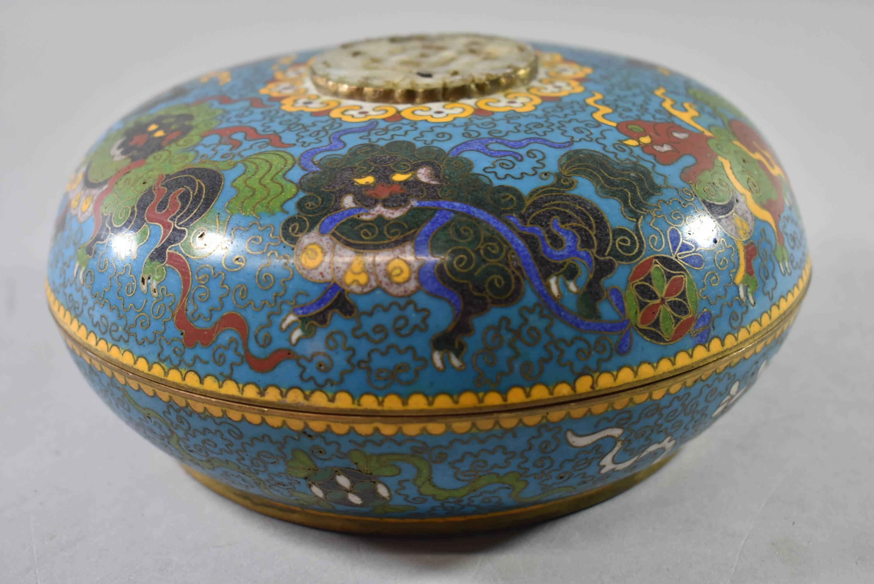 Antique Chinese cloisonne covered bowl with hand-cut white jade top medallion, very good condition with enamel work on all sides. Measures: 7 3/4
