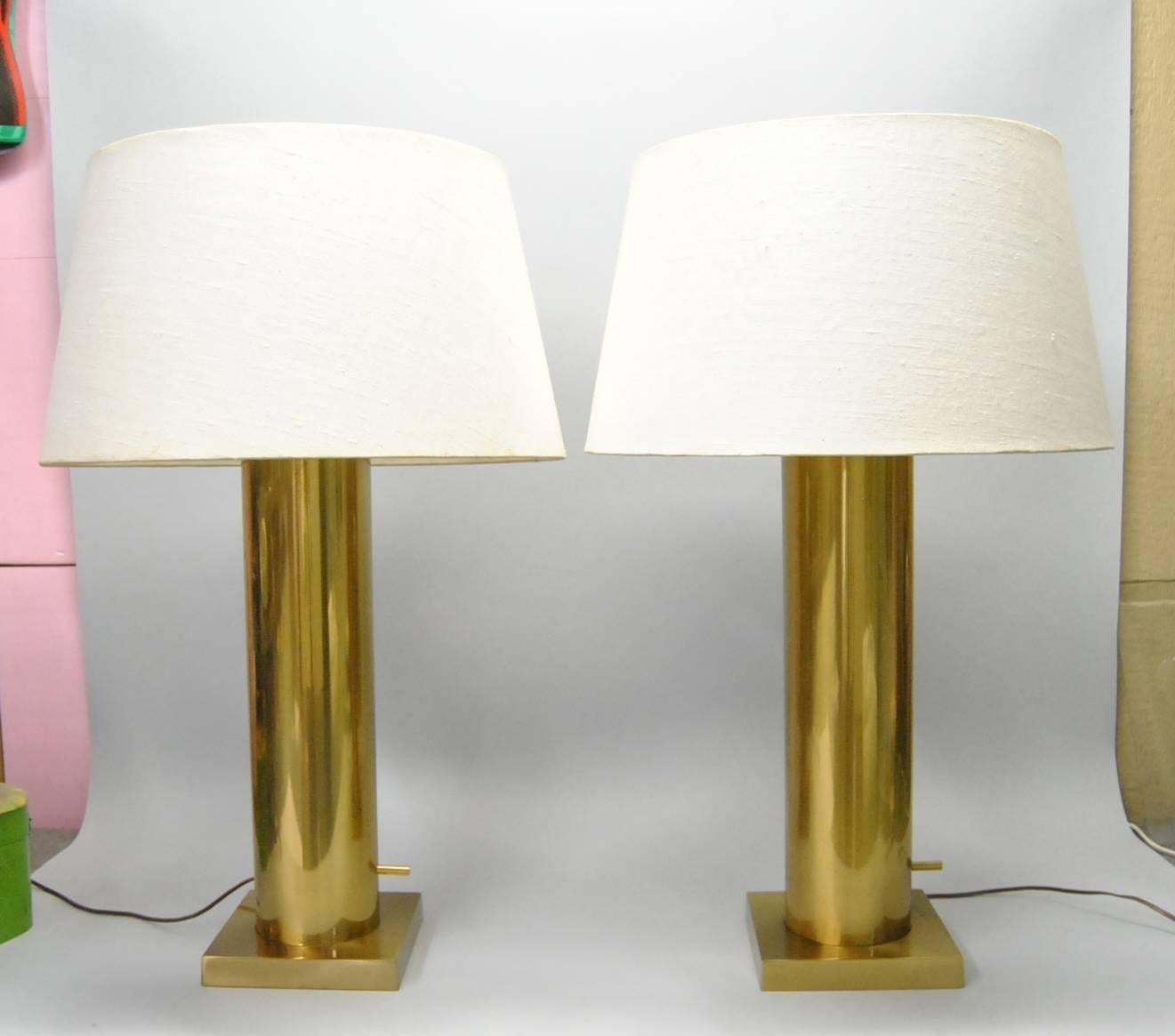 A great pair of Mid-Century cylinder lamps by Stiffel. Clean, crisp lines on these lamps make them a standout in just about any decor. A 7.5