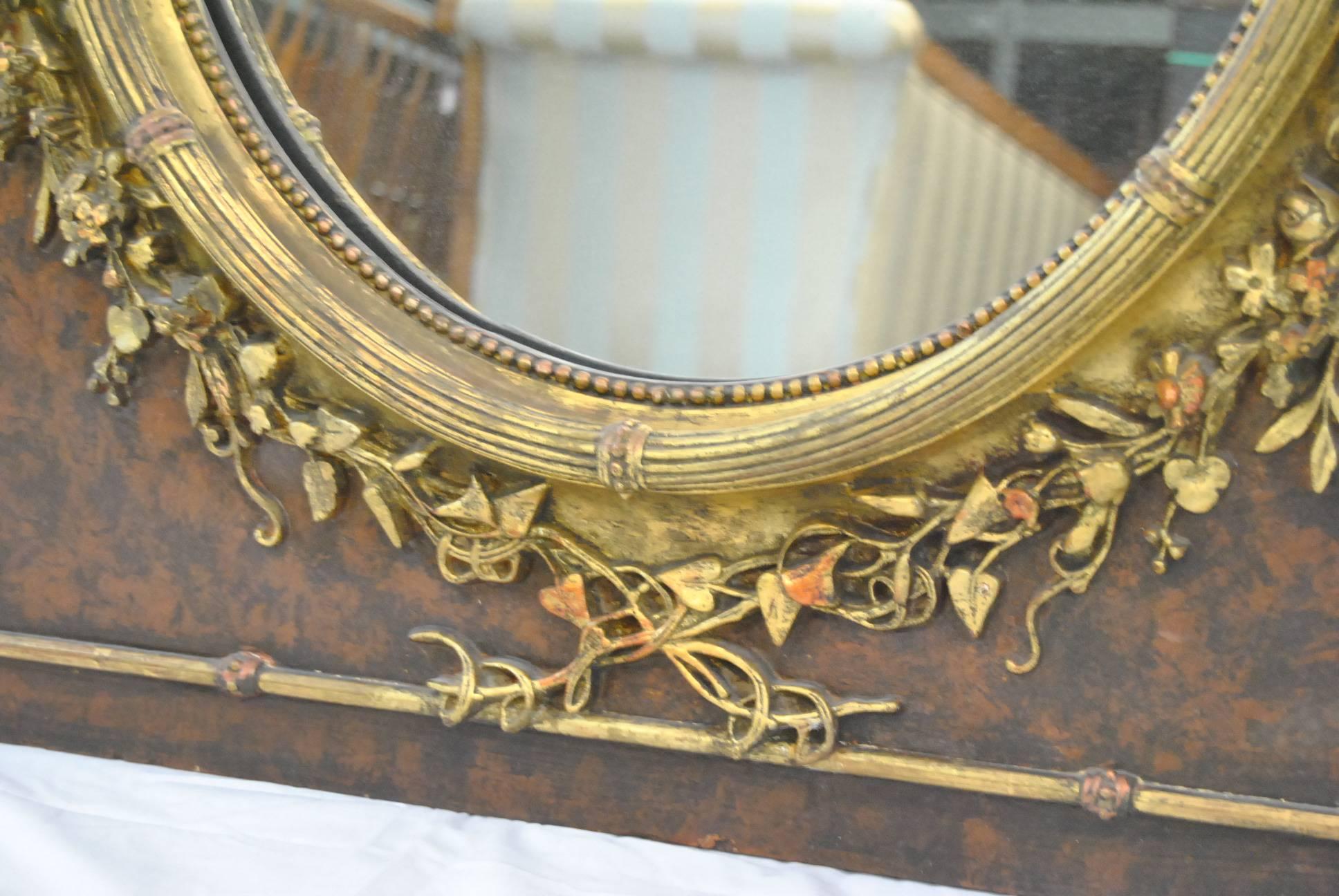 Victorian Oval Mirror with High Relief Floral Detail and Central Bow In Good Condition In Toledo, OH