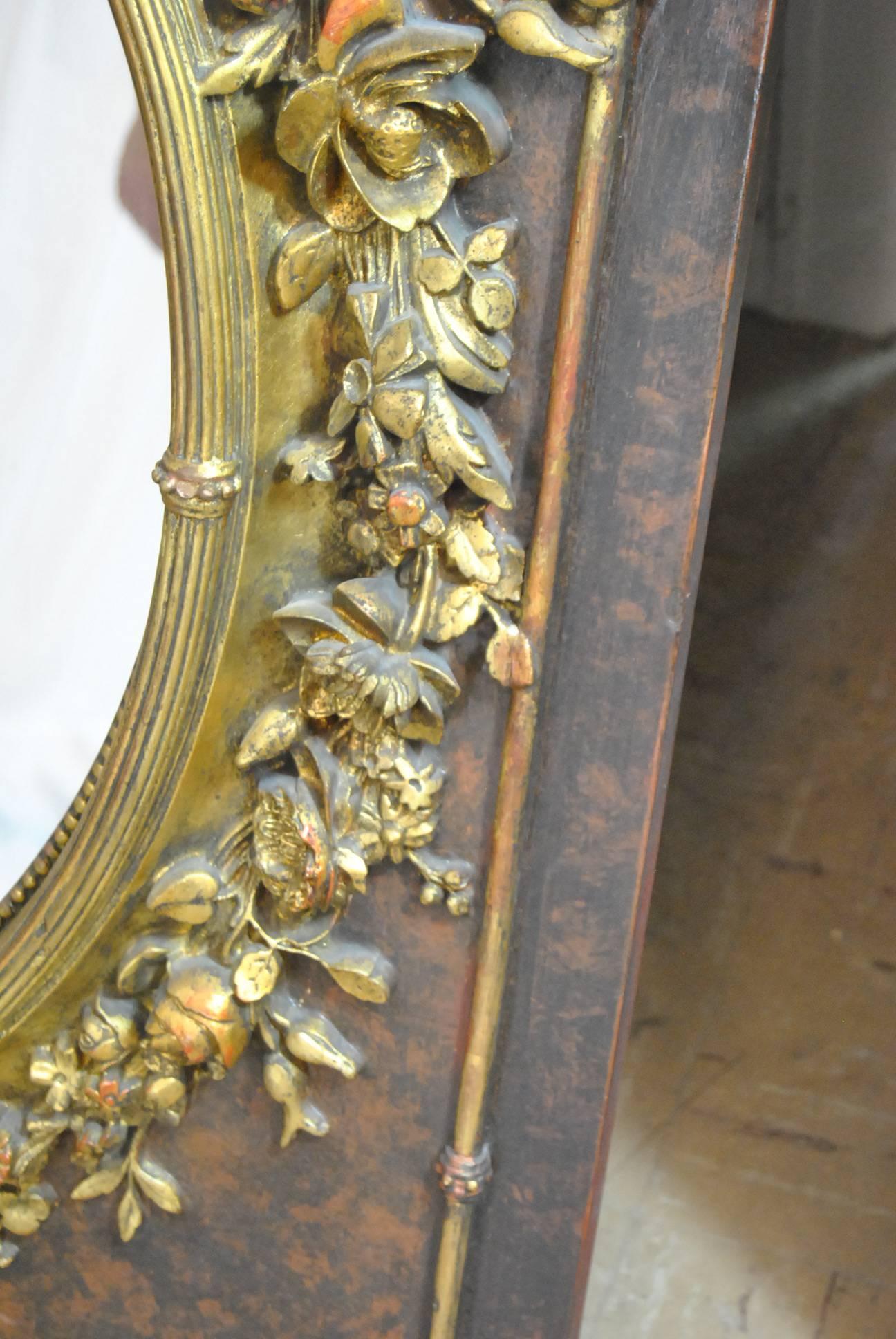 Victorian Oval Mirror with High Relief Floral Detail and Central Bow 1