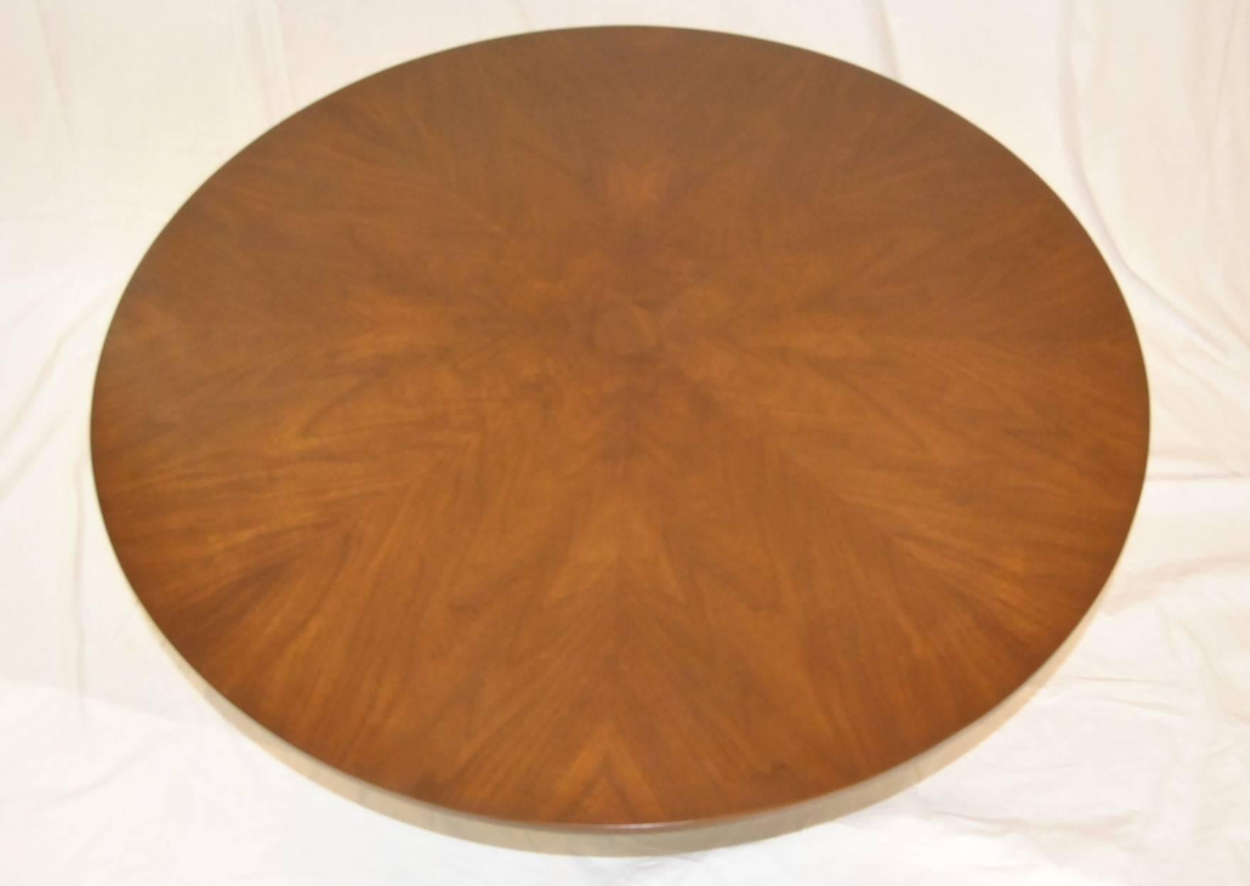 A great walnut game table by John Widdicomb.  The table is 48